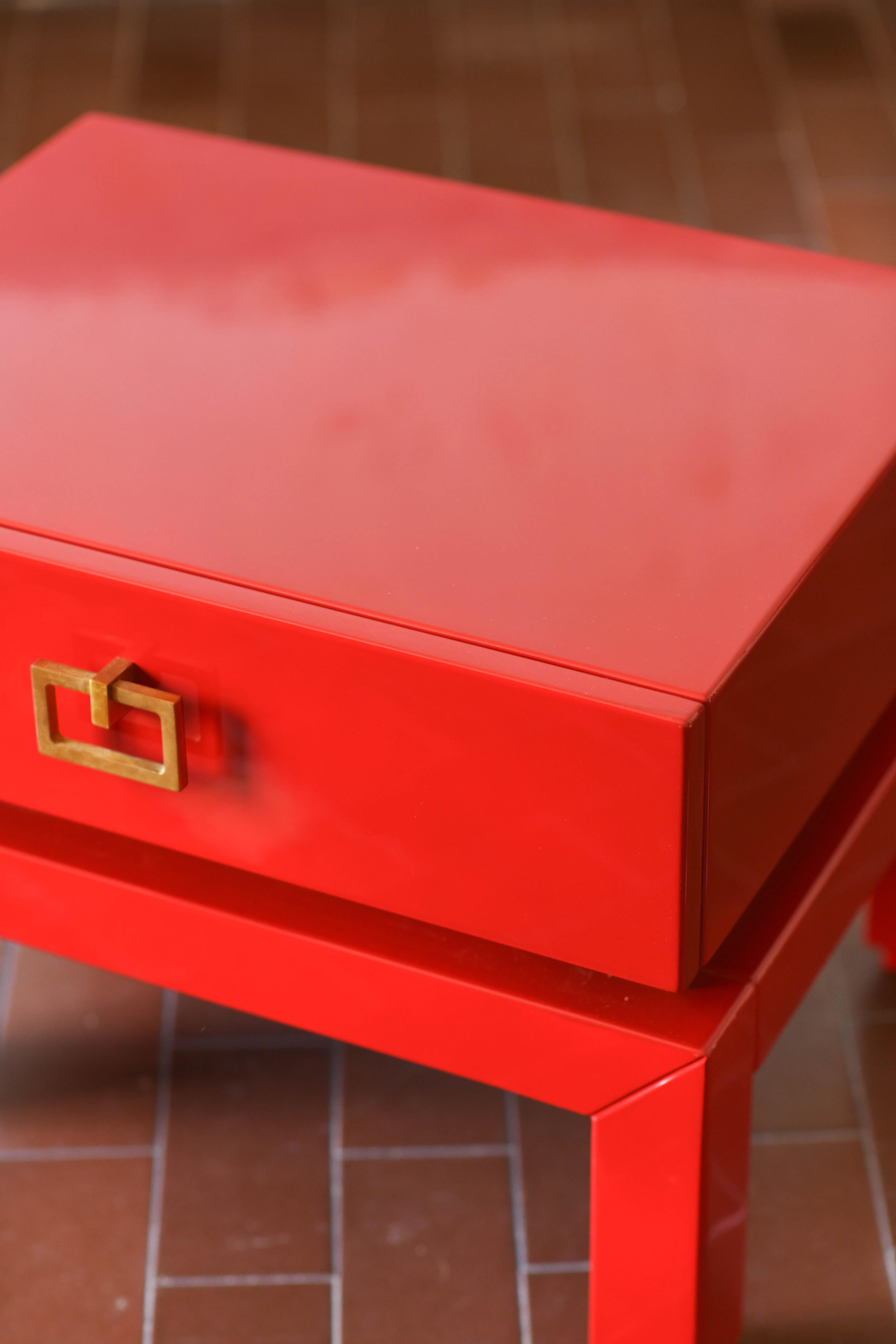 Brass Pair of china red bedside tables with brass details from the 1970s  For Sale