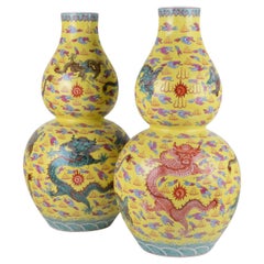 Vintage Pair of China Yellow Background Vases with Dragons