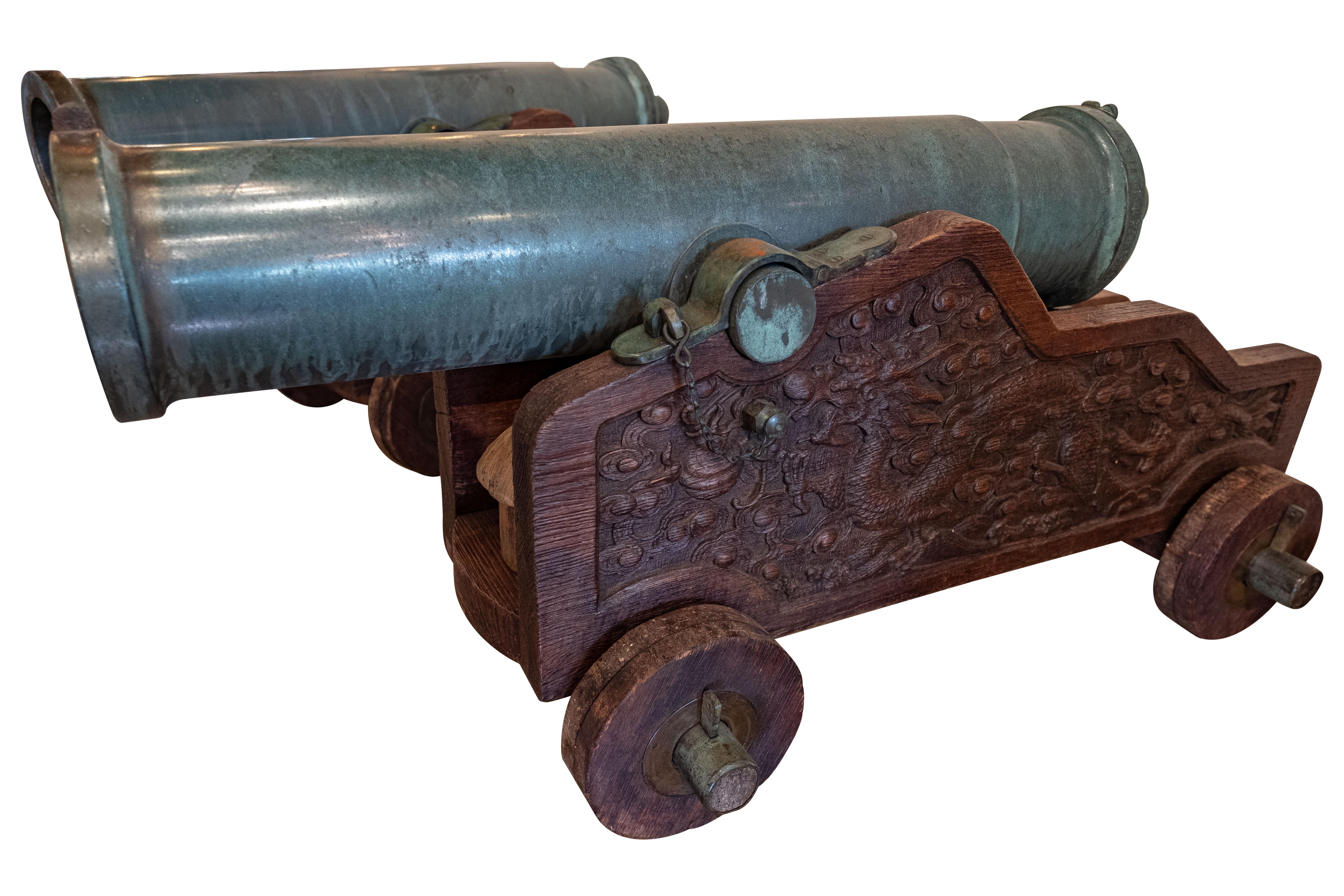 These beautiful cannons were made in 1866 and 1867 in China, and were found in the Lowther castle in Cumbria, seat of the Earls of Lonsdale. They each have a non-tapering tubular construction, with a prominent raised muzzle-tin carrying the