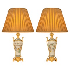 pair of Chinese 18th century Porcelain and French Louis XVI st. Ormolu lamps