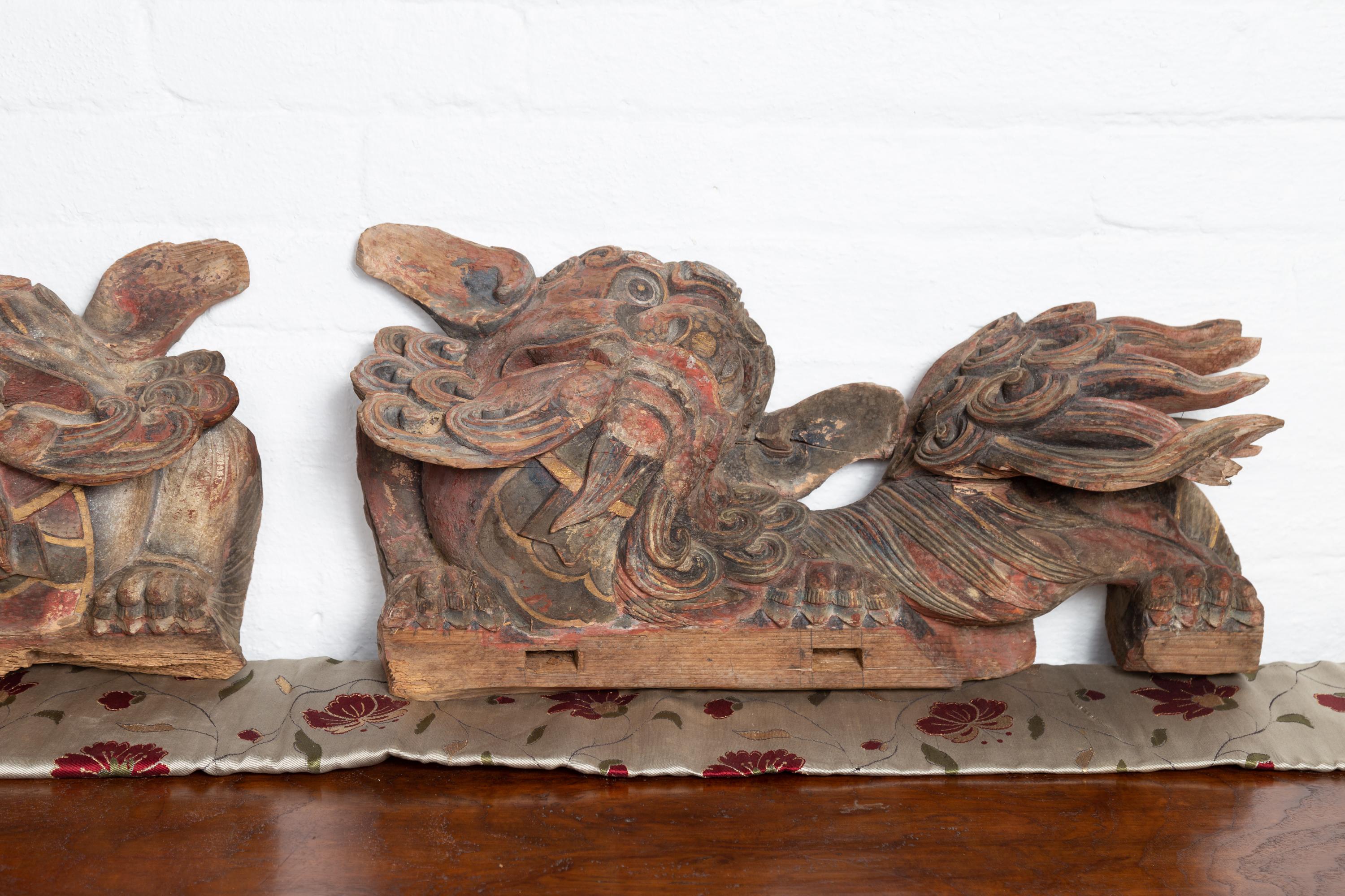 Wood Pair of Chinese 19th Century Hand Carved and Painted Temple Guardian Lions For Sale
