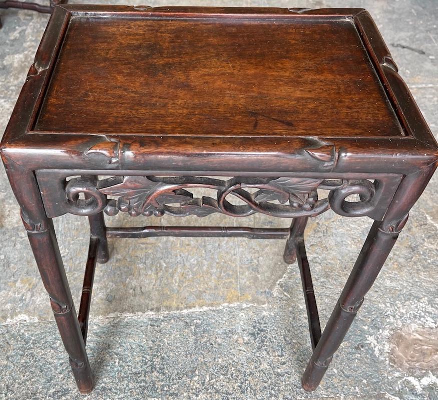 Pair of Chinese 19th Century Hand Carved Nesting Tables In Distressed Condition In Santa Monica, CA