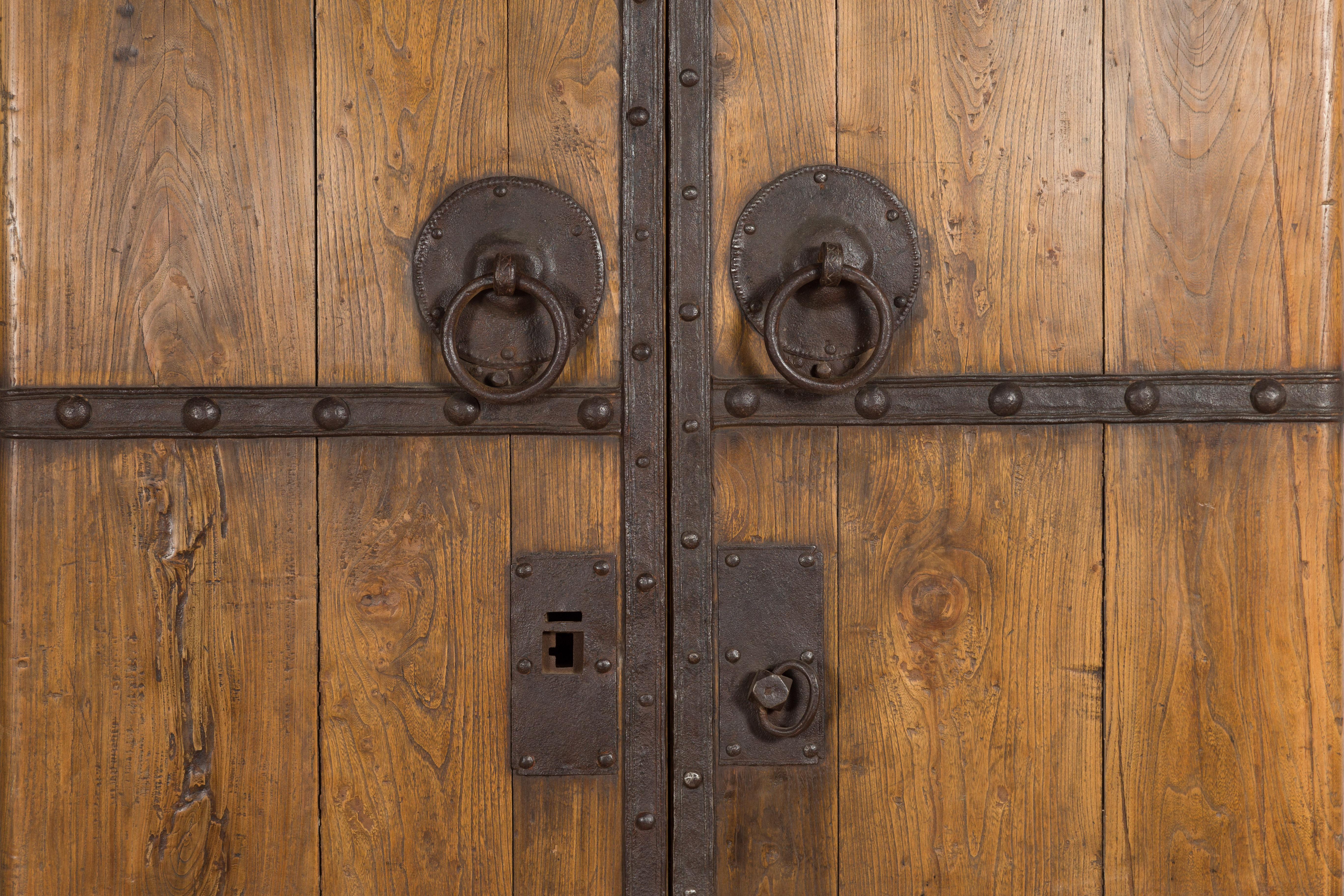 Pair of 19th Century Qing Dynasty Wooden Palace Doors with Iron Fittings In Good Condition For Sale In Yonkers, NY