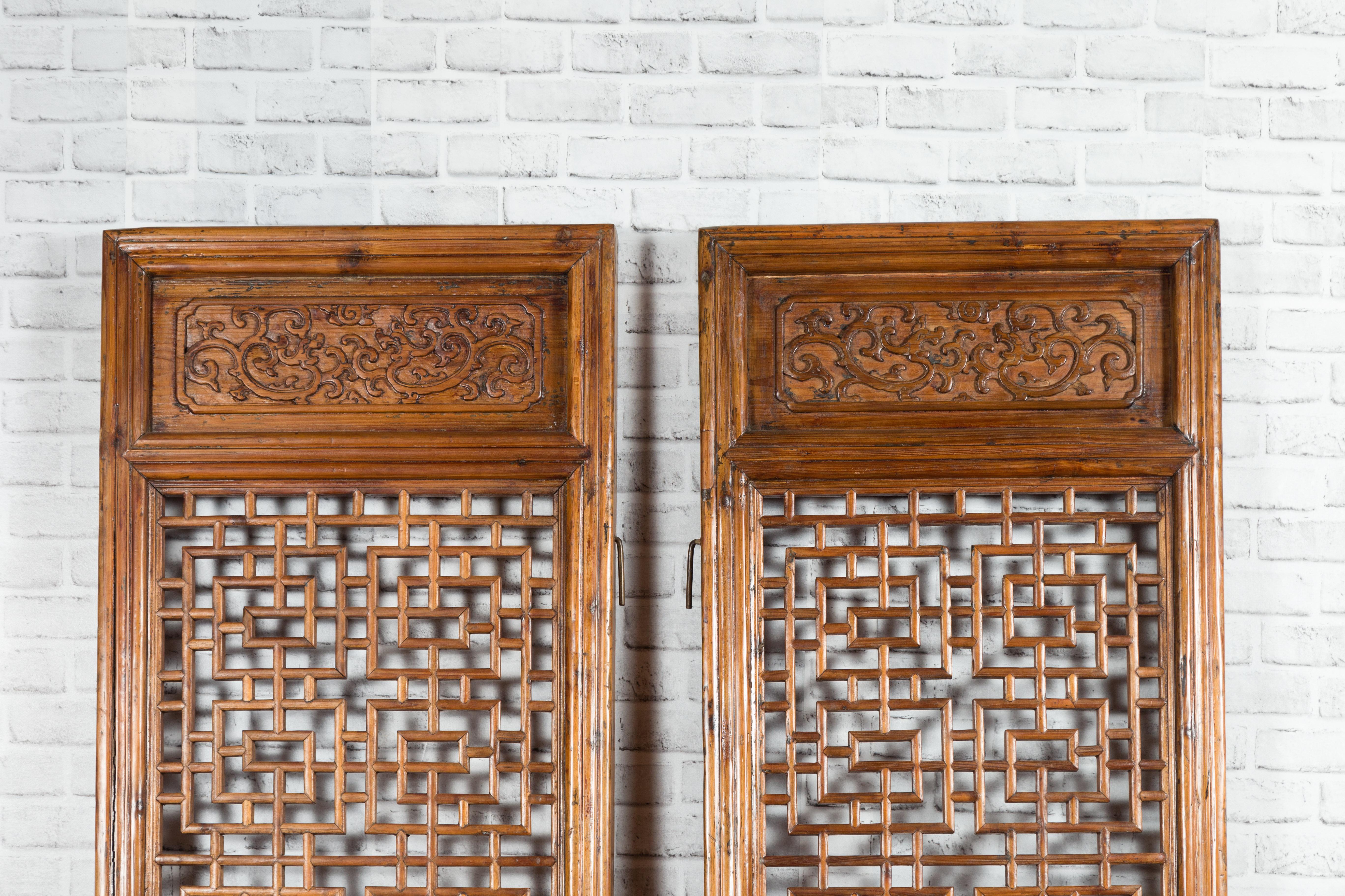Pair of Chinese 19th Century Screens with Fretwork and Low-Relief Carved Panels In Good Condition In Yonkers, NY
