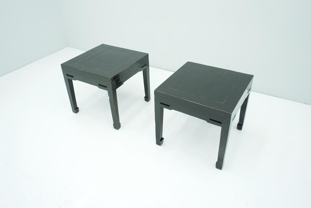 Pair of black Chinese antique side tables. Original condition.
Details

Creator: unknown
Period: crica 1880
Color: black
Style: unknown
Place of Origin: China
Dimensions: Height: 19.1 in. (48.5 cm) Width: 16.54 in. (42 cm) Depth: 16.54 in. (42