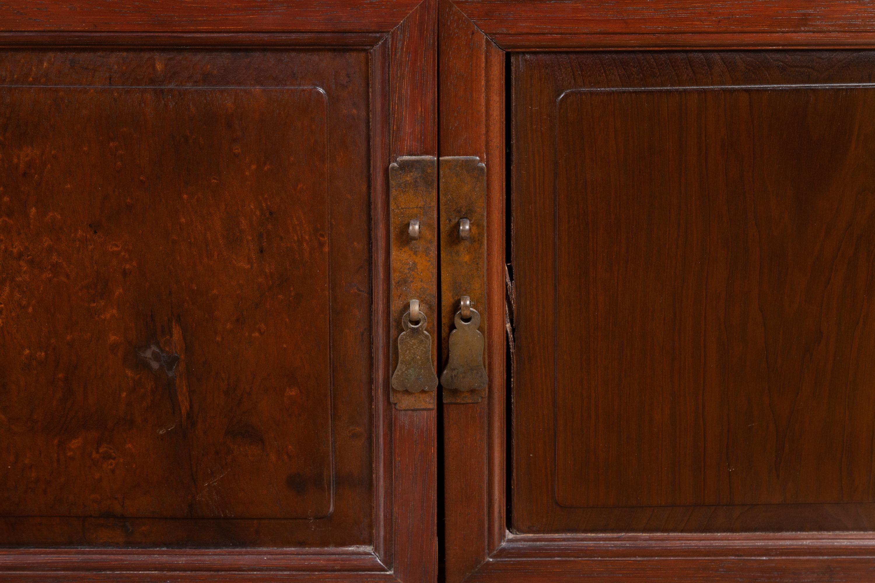 20th Century Pair of Chinese Antique Wood Low Cabinets with Brass Hardware and Raised Accents