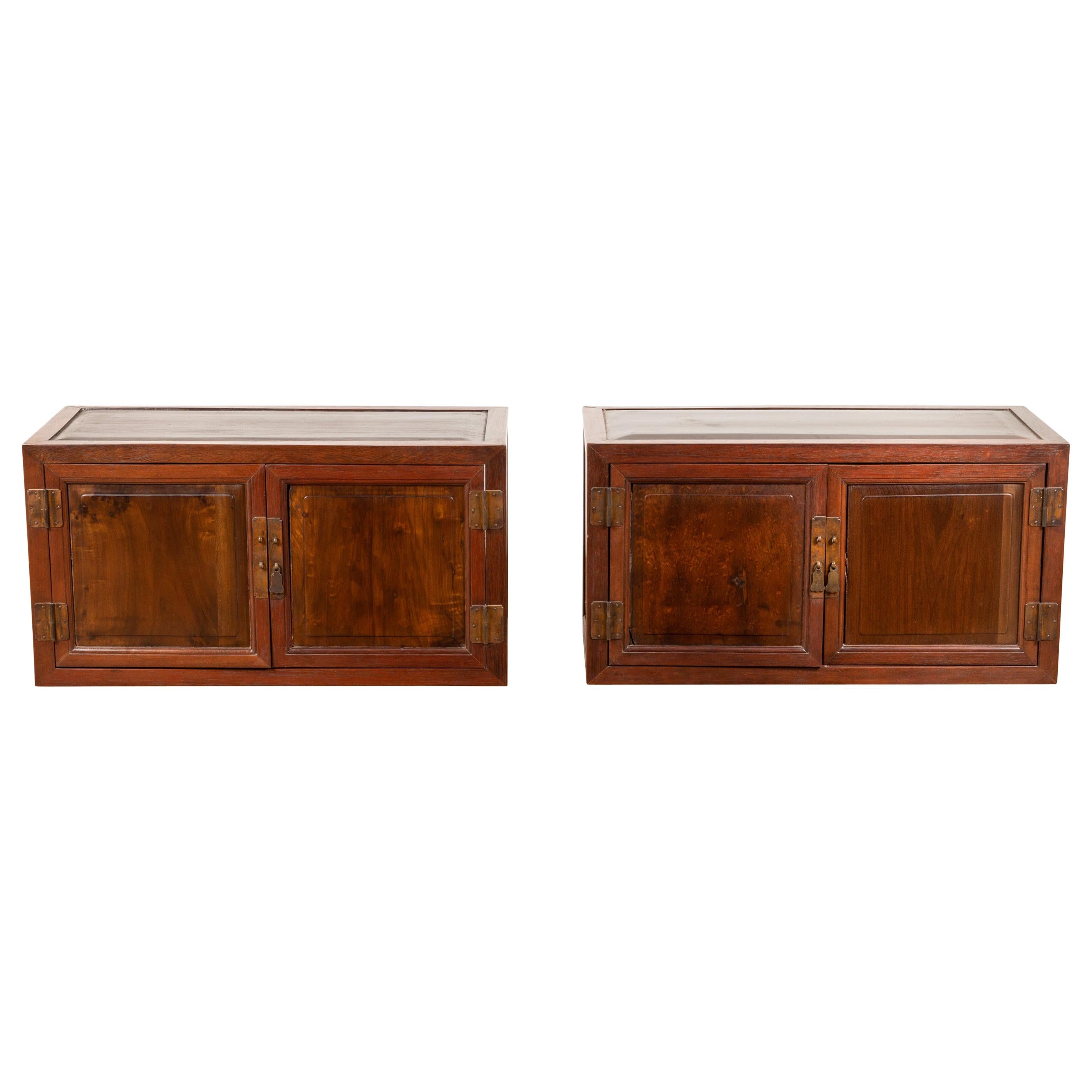 Pair of Chinese Antique Wood Low Cabinets with Brass Hardware and Raised Accents