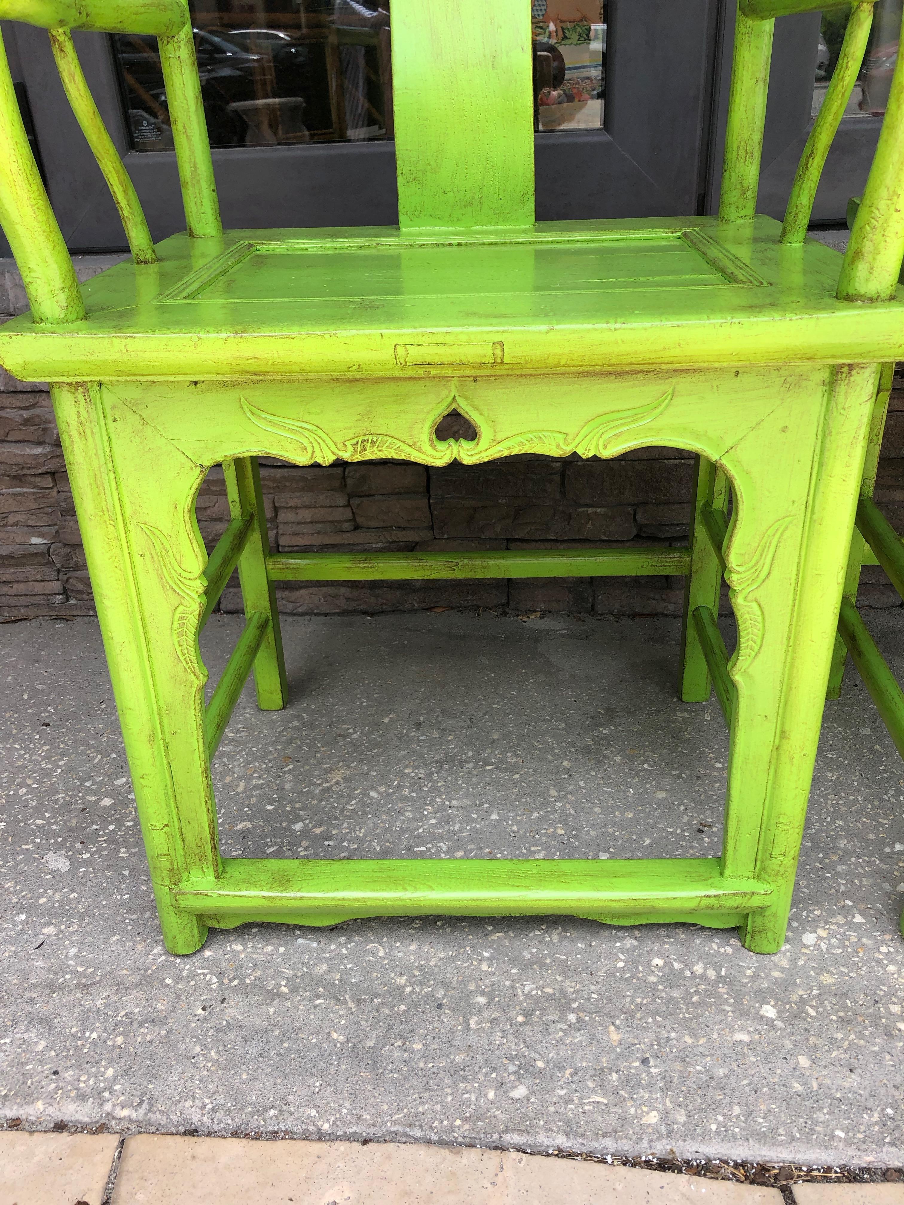 This Pair of Chinese Yolk Back Armchairs have been re-freshed with green paint and brown stained atop