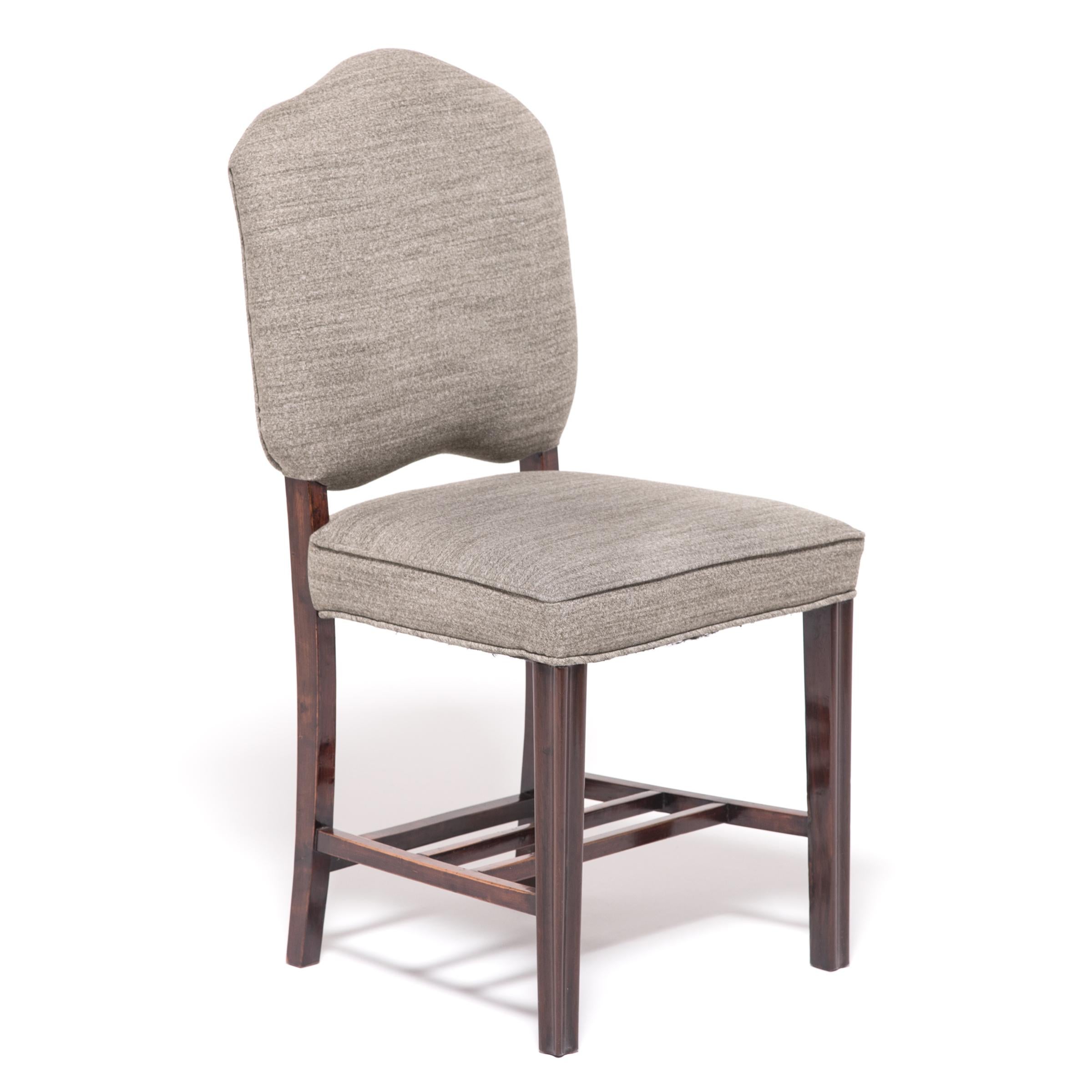 Made in the 1920s to satisfy the worldwide hunger for all things Art Deco, these unique chairs combine the streamlined style of the era with a Classic Chinese aesthetic. The beautiful hardwood frames hint at tradition with bamboo-like modeling and