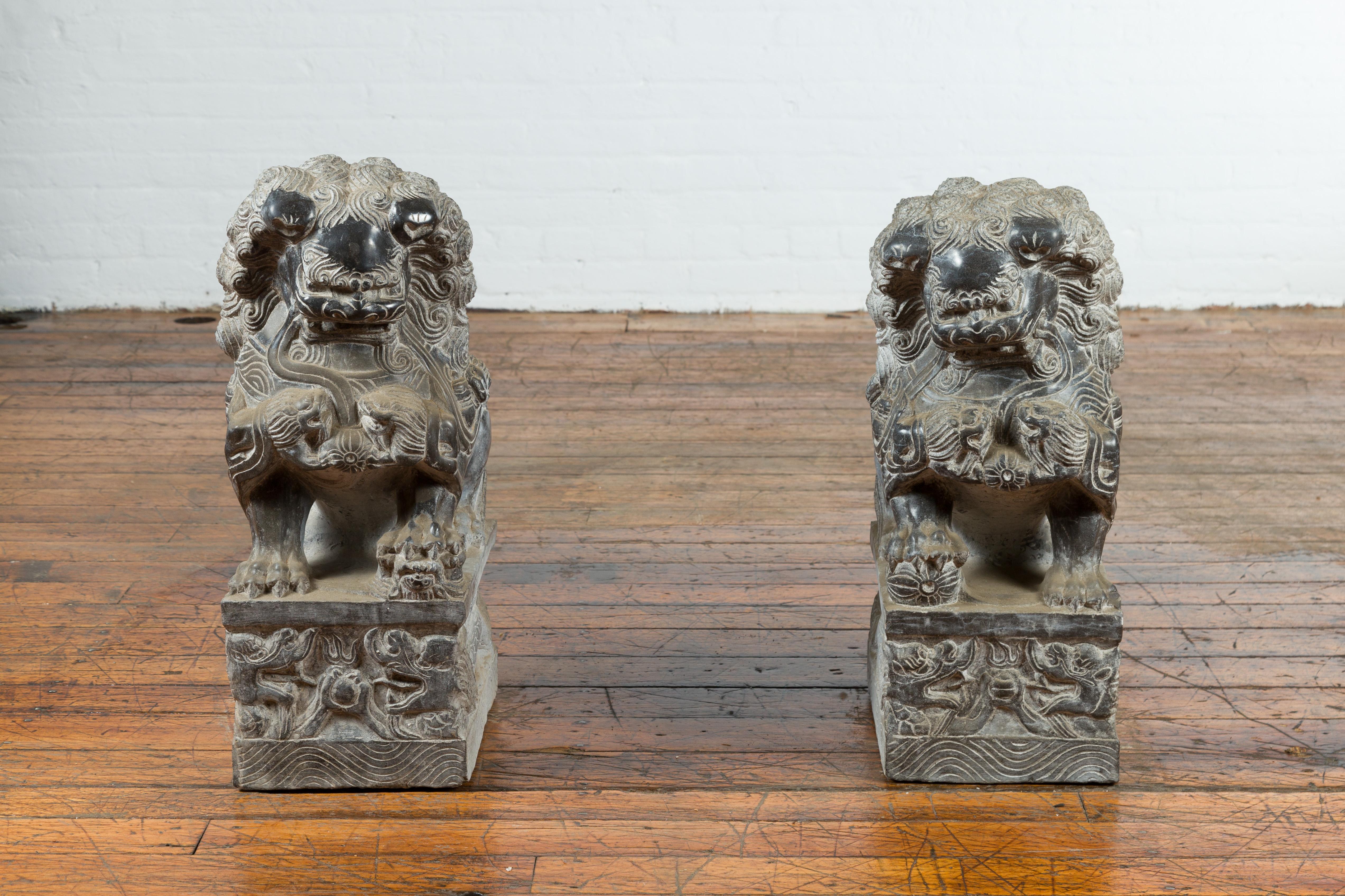 Carved Pair of Chinese Black Marble Contemporary Facing Foo Dogs Guardian Lions For Sale