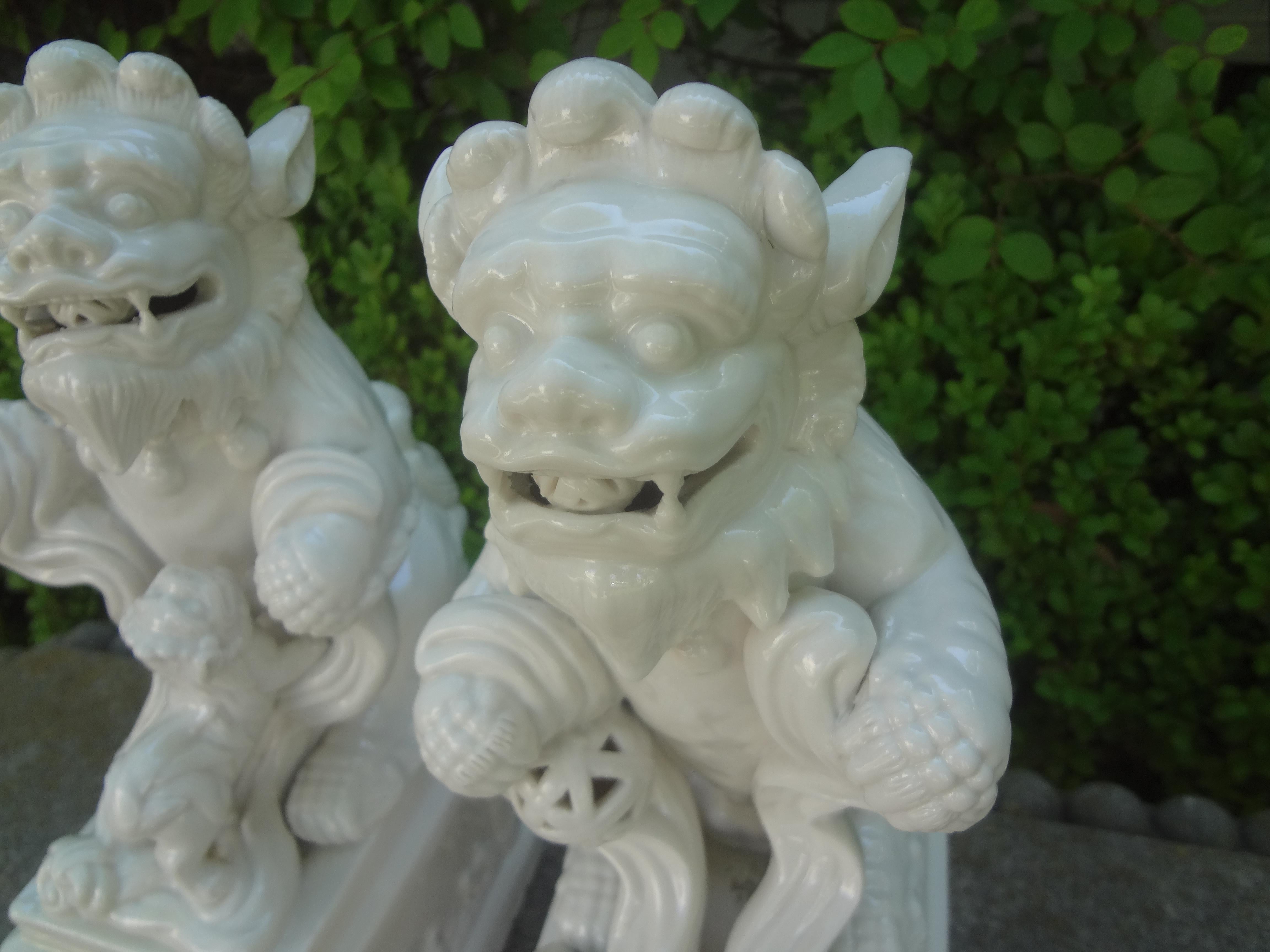 Chinese Export Pair of Chinese Blanc De Chine Foo Dogs