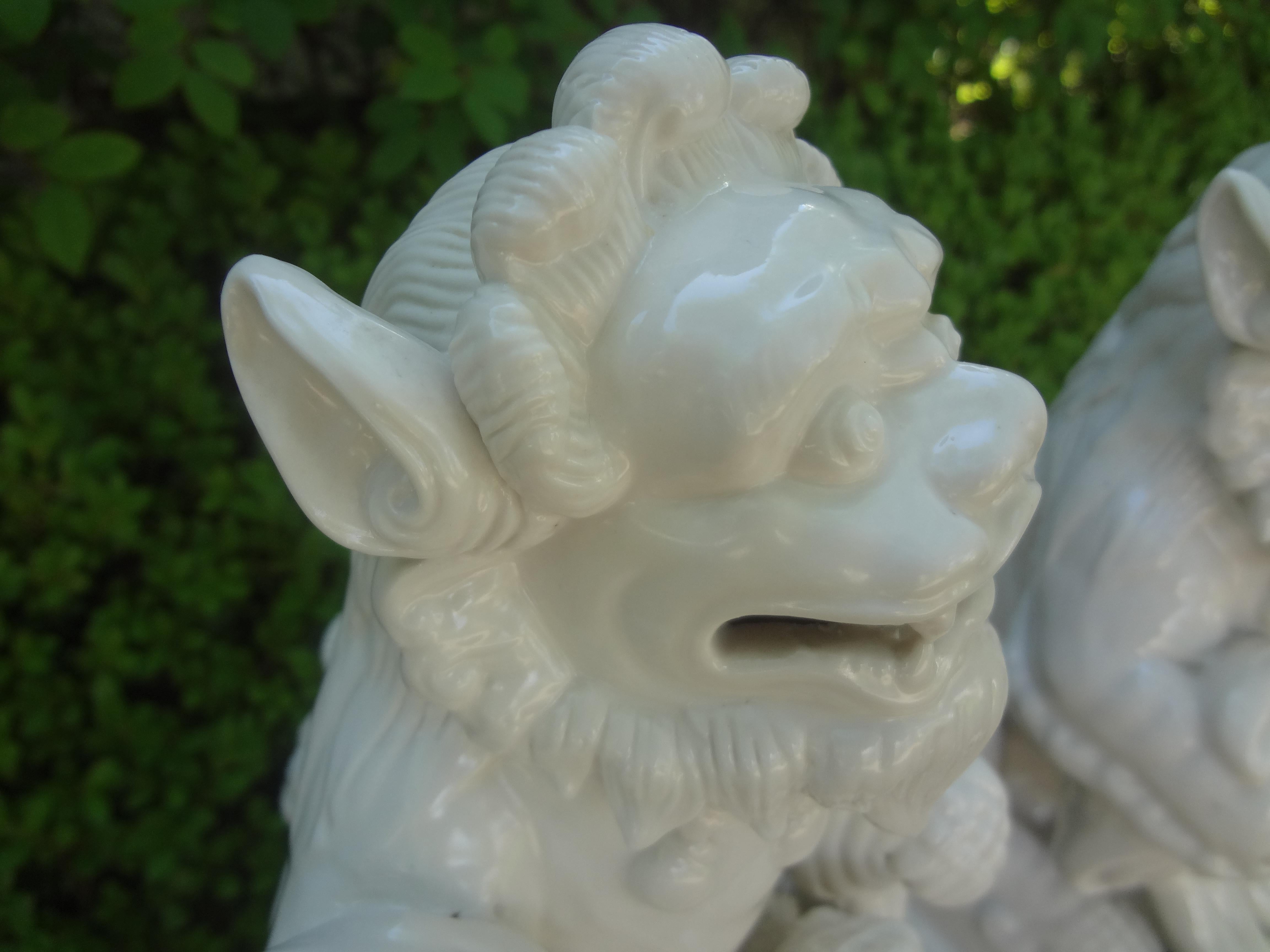 Pair of Chinese Blanc De Chine Foo Dogs In Good Condition In Houston, TX