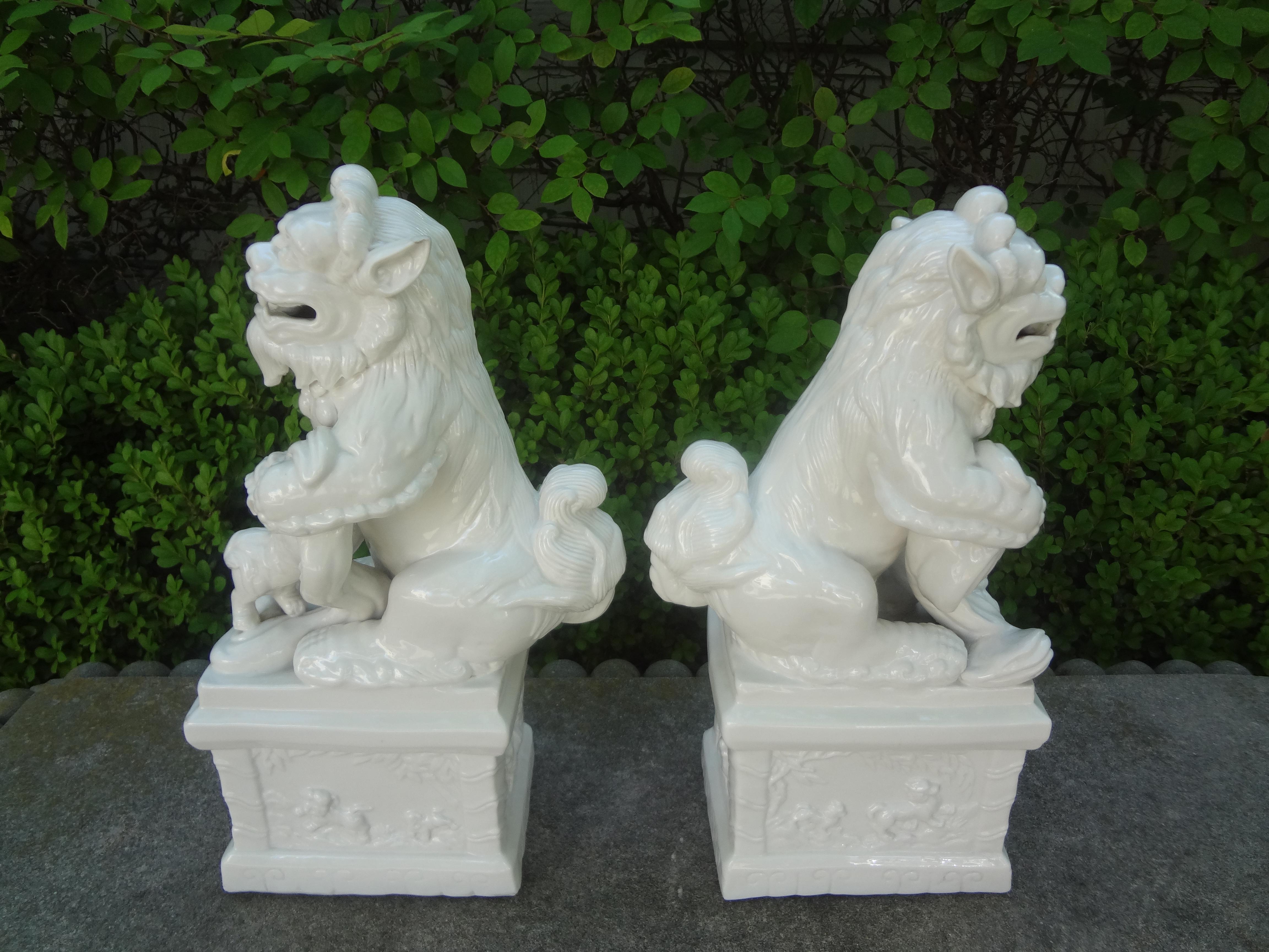 Porcelain Pair of Chinese Blanc De Chine Foo Dogs