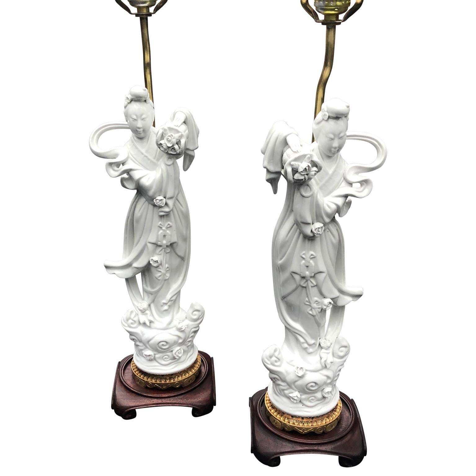 Chinoiserie Pair of Chinese White Porcelain Blanc de Chine Guanyin And Lotus Leaf Lamps