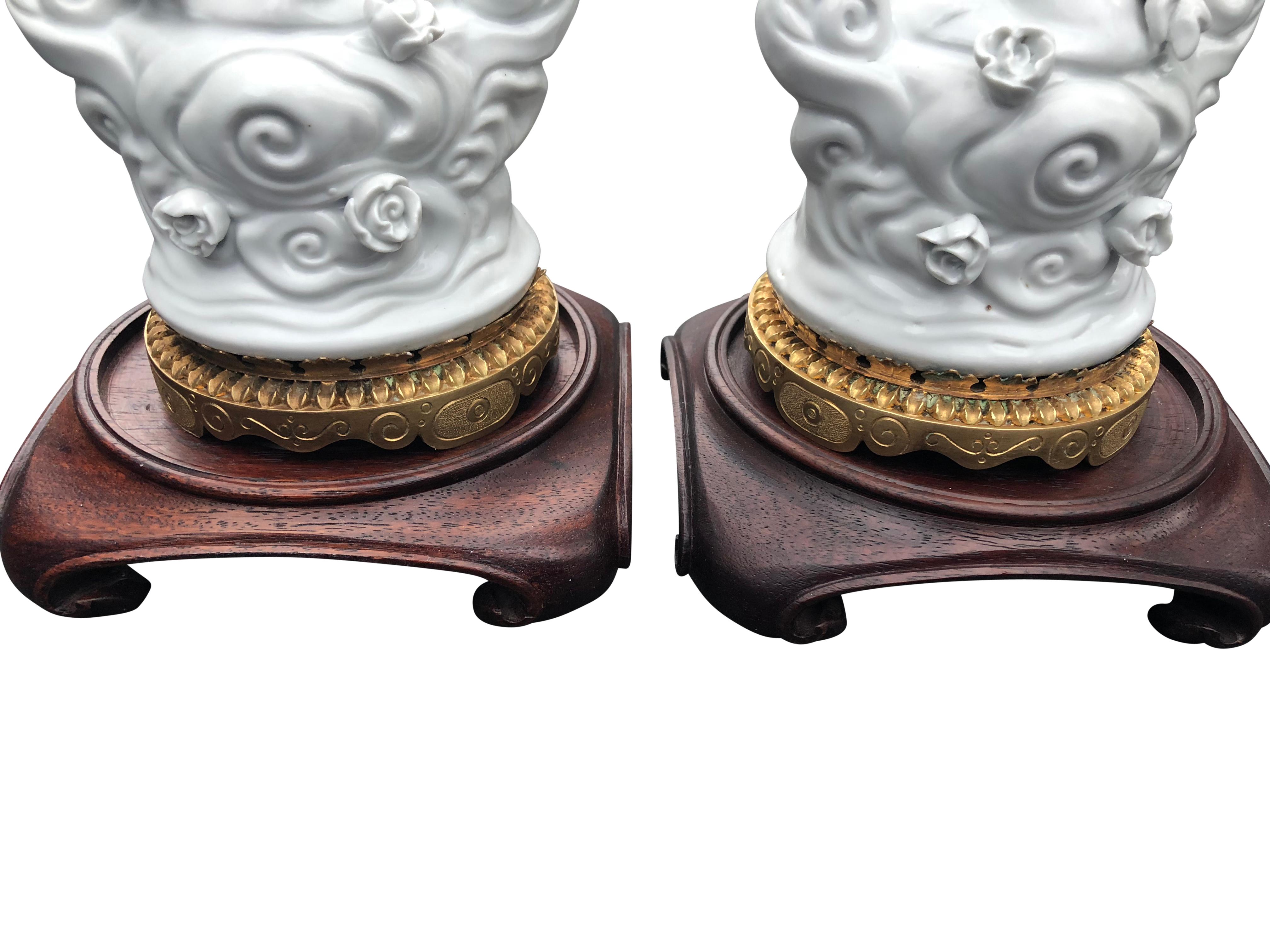 Hand-Crafted Pair of Chinese White Porcelain Blanc de Chine Guanyin And Lotus Leaf Lamps