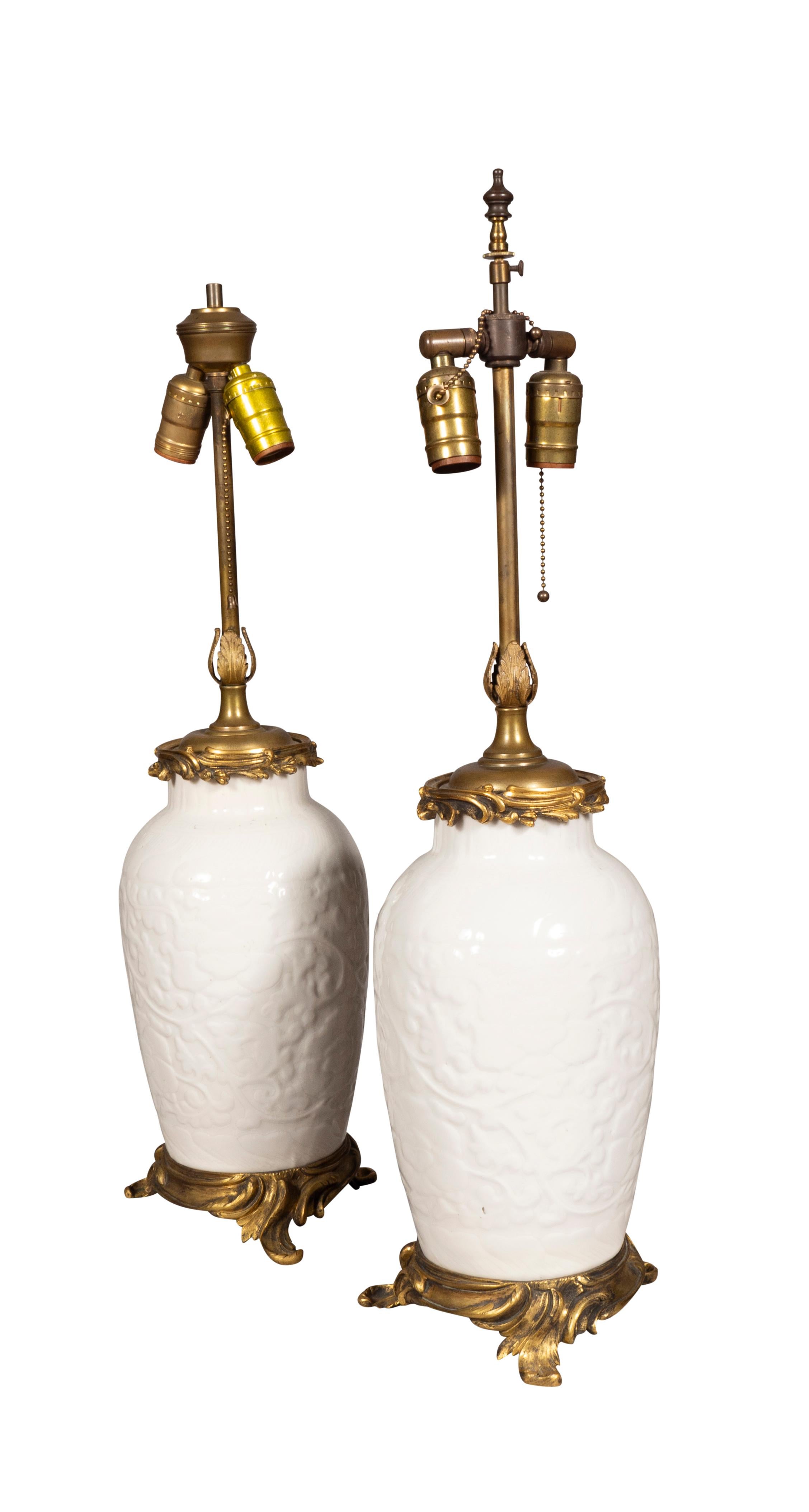 Louis XV Pair Of Chinese Blanc De Chine Porcelain Ormolu Mounted Table Lamps