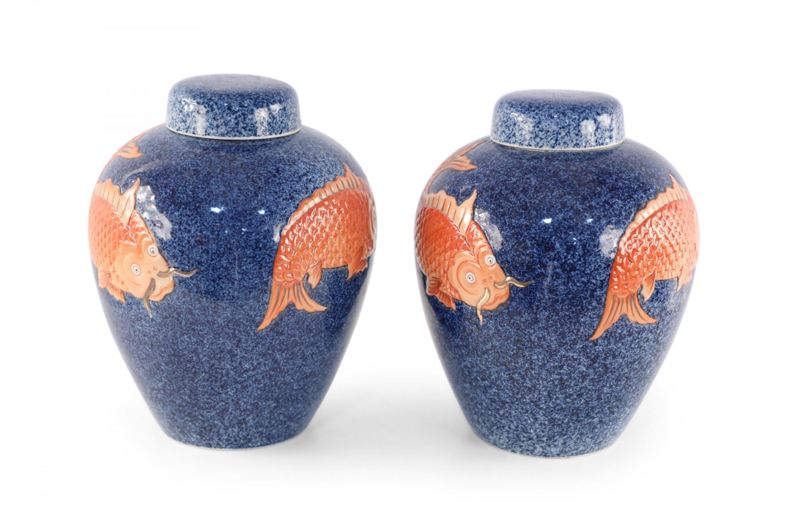 20th Century Pair of Chinese Blue and Orange Fish Design Lidded Porcelain Jars For Sale