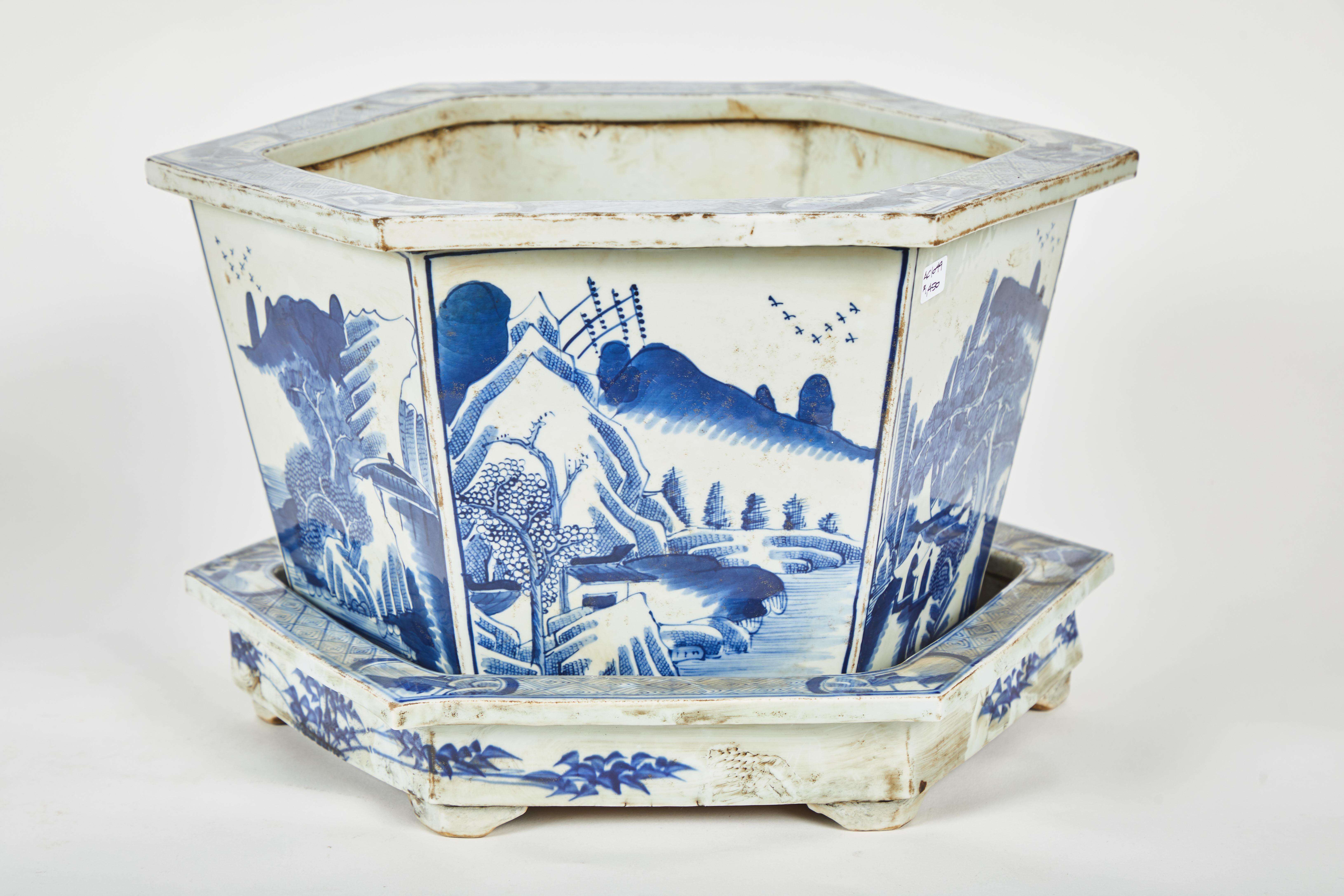 Chinese Export Pair of Chinese Blue and White Cachepots with Underplates