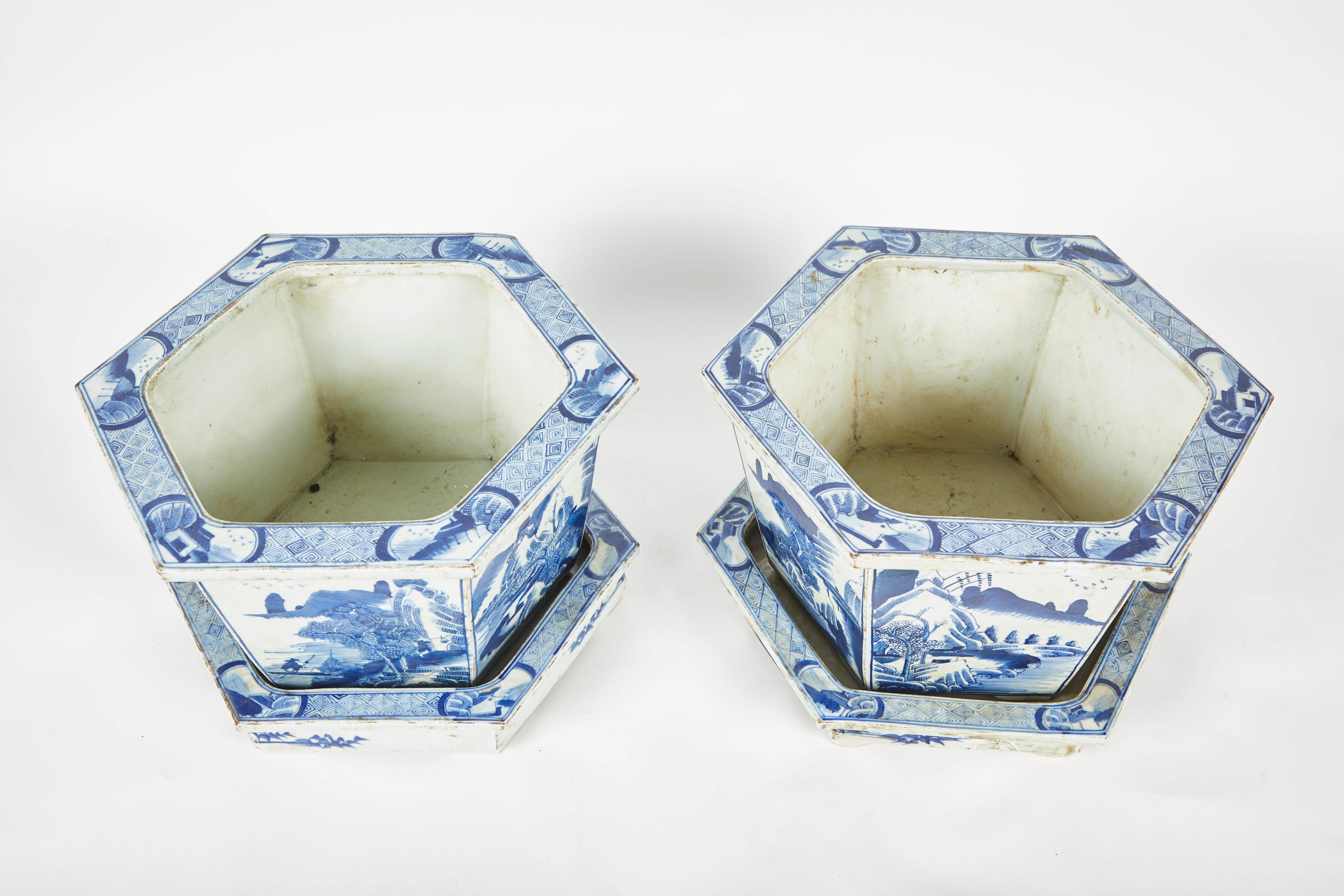 Ceramic Pair of Chinese Blue and White Cachepots with Underplates