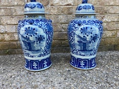 Pair of Chinese Blue and White Jars with Lids