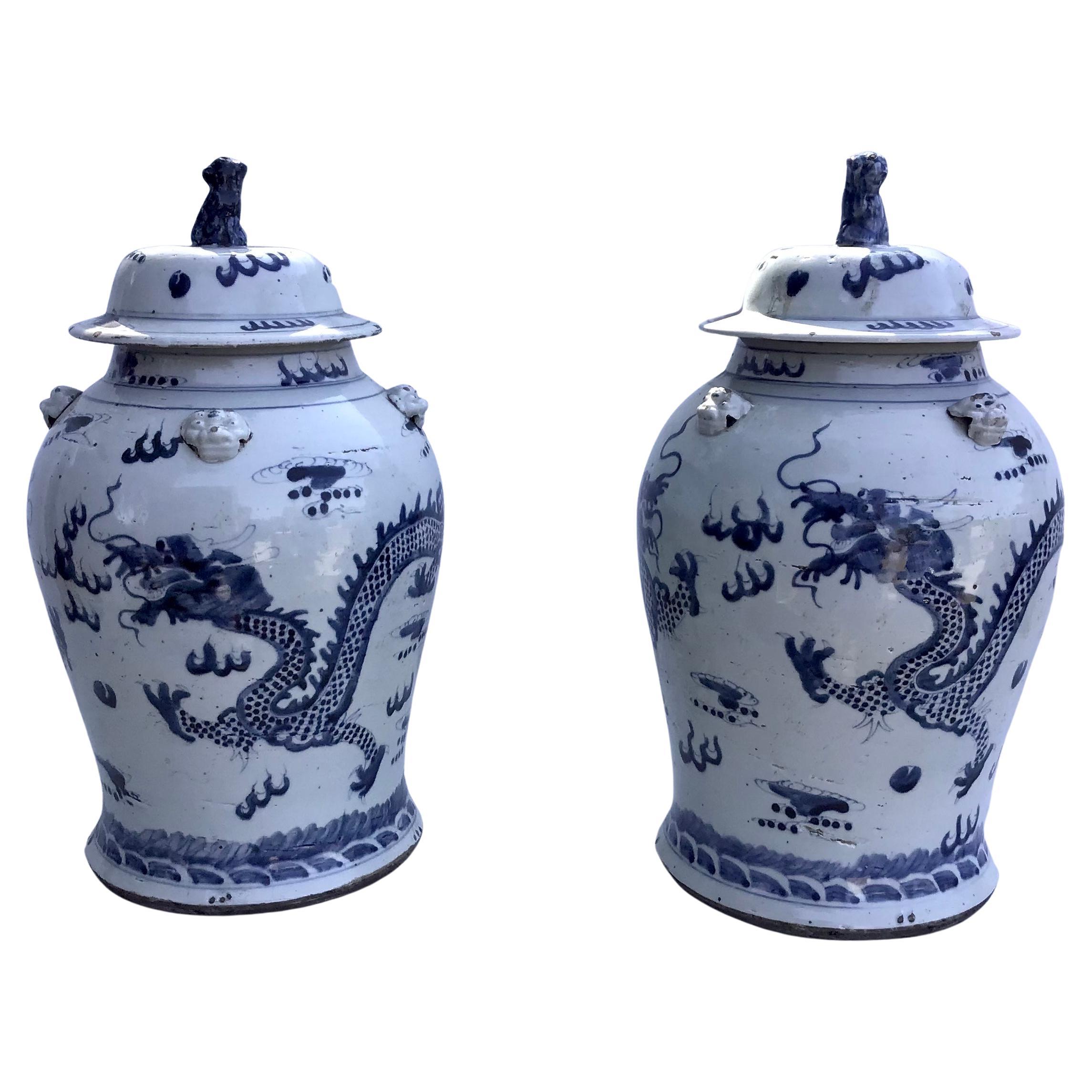 Pair of Chinese Blue and White Jars with Lids