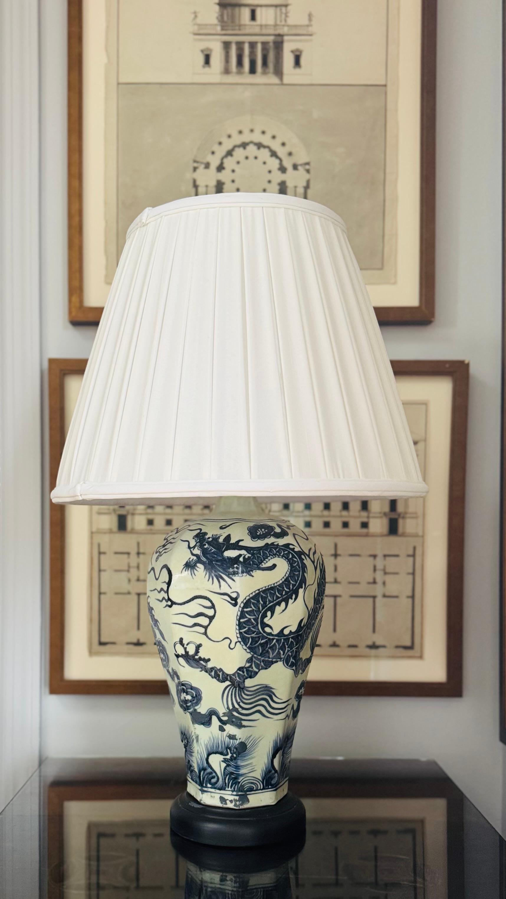 Chinoiserie Pair of Chinese Blue and White Lamps with dragon motif For Sale