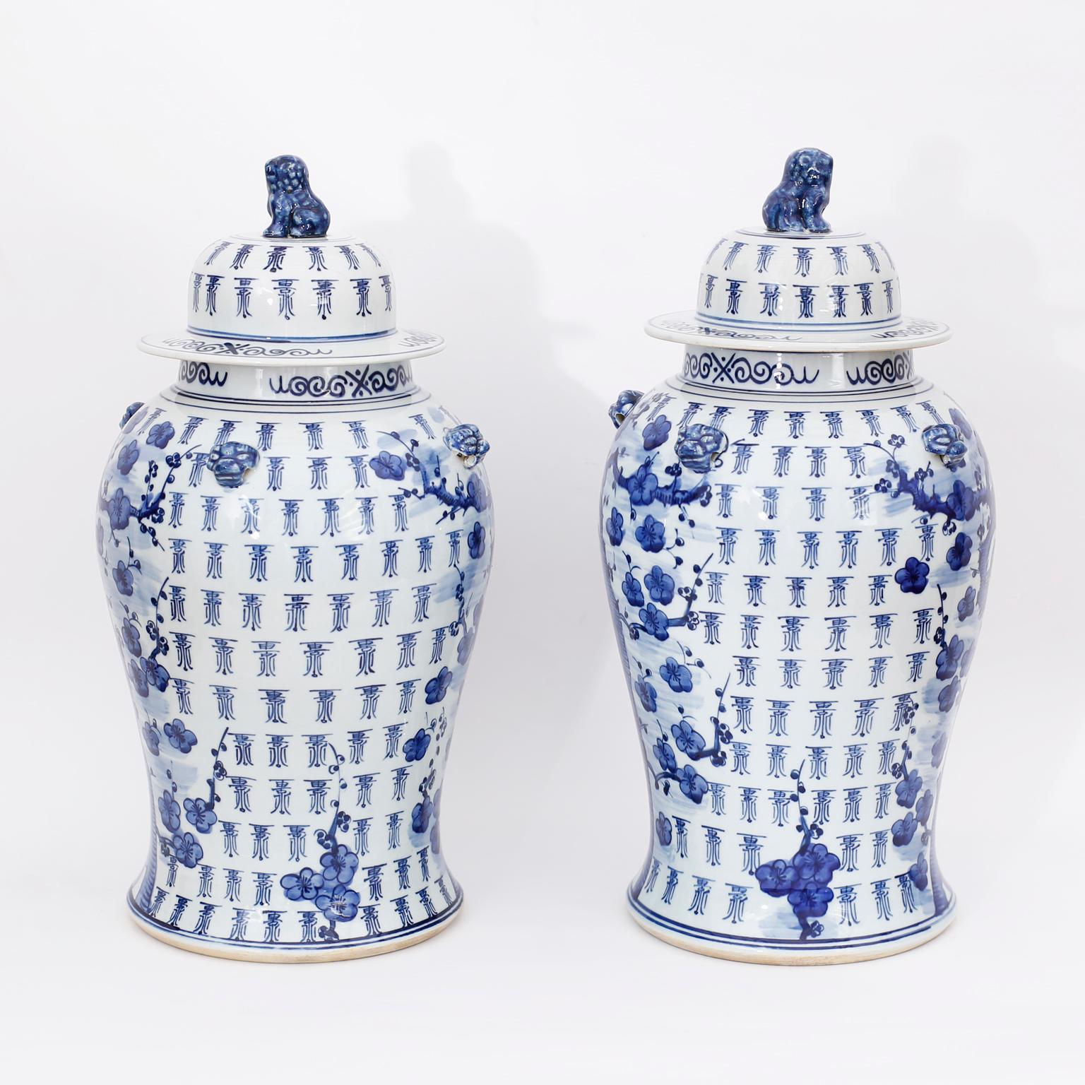 Chinese Export Pair of Chinese Blue and White Porcelain Cherry Blossom Lidded Jars
