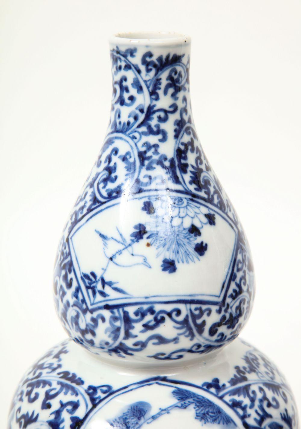 19th Century Pair of Chinese Blue and White Porcelain Double Gourd Vases