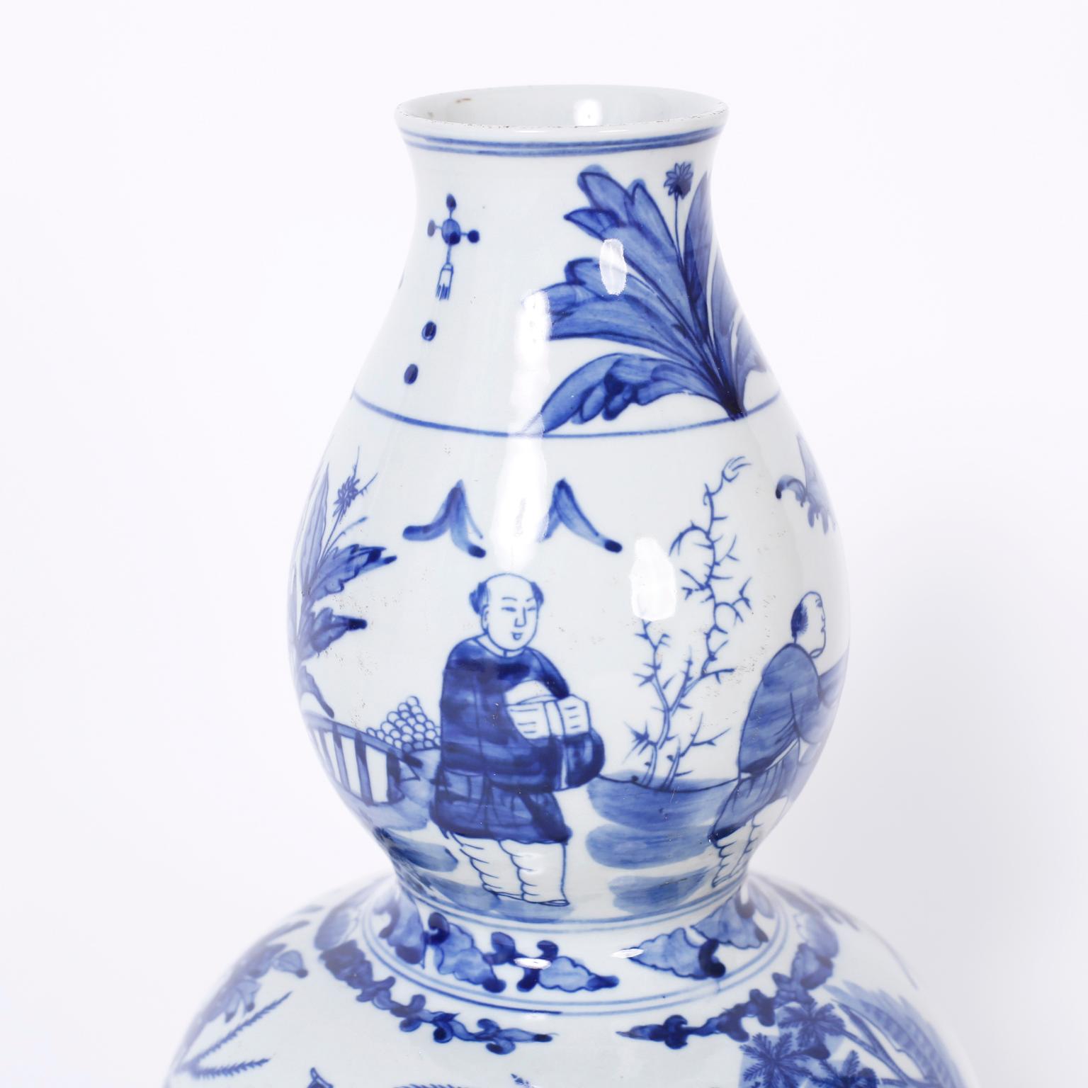 Hand-Painted Pair of Chinese Blue and White Porcelain Double Gourd Vases