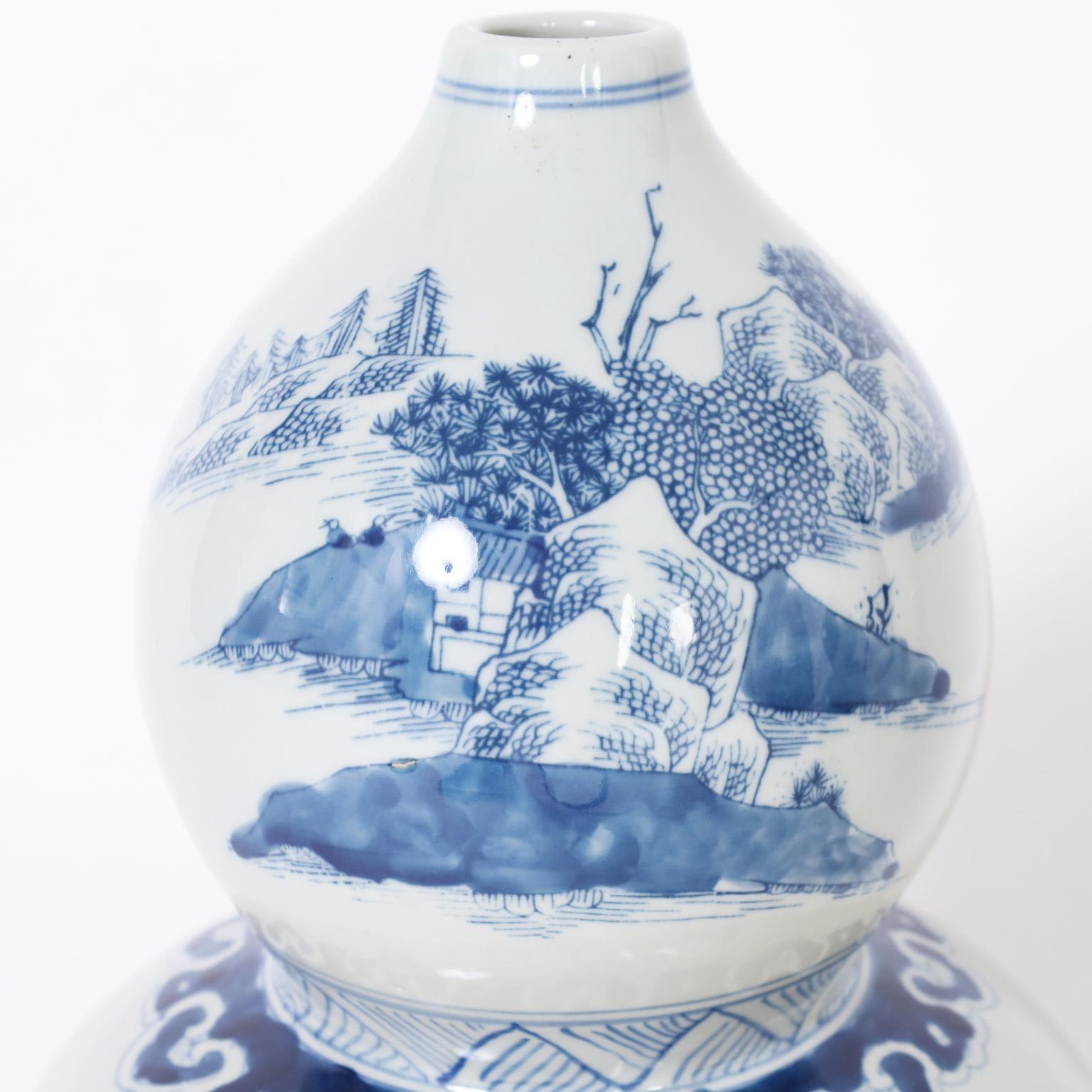 Pair of Chinese Blue and White Porcelain Double Gourd Vases In Good Condition For Sale In Palm Beach, FL
