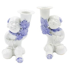 Pair of Chinese Blue and White Porcelain Figural Candlesticks