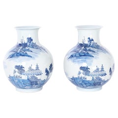 Pair of Chinese Blue and White Porcelain Vases with Pagodas