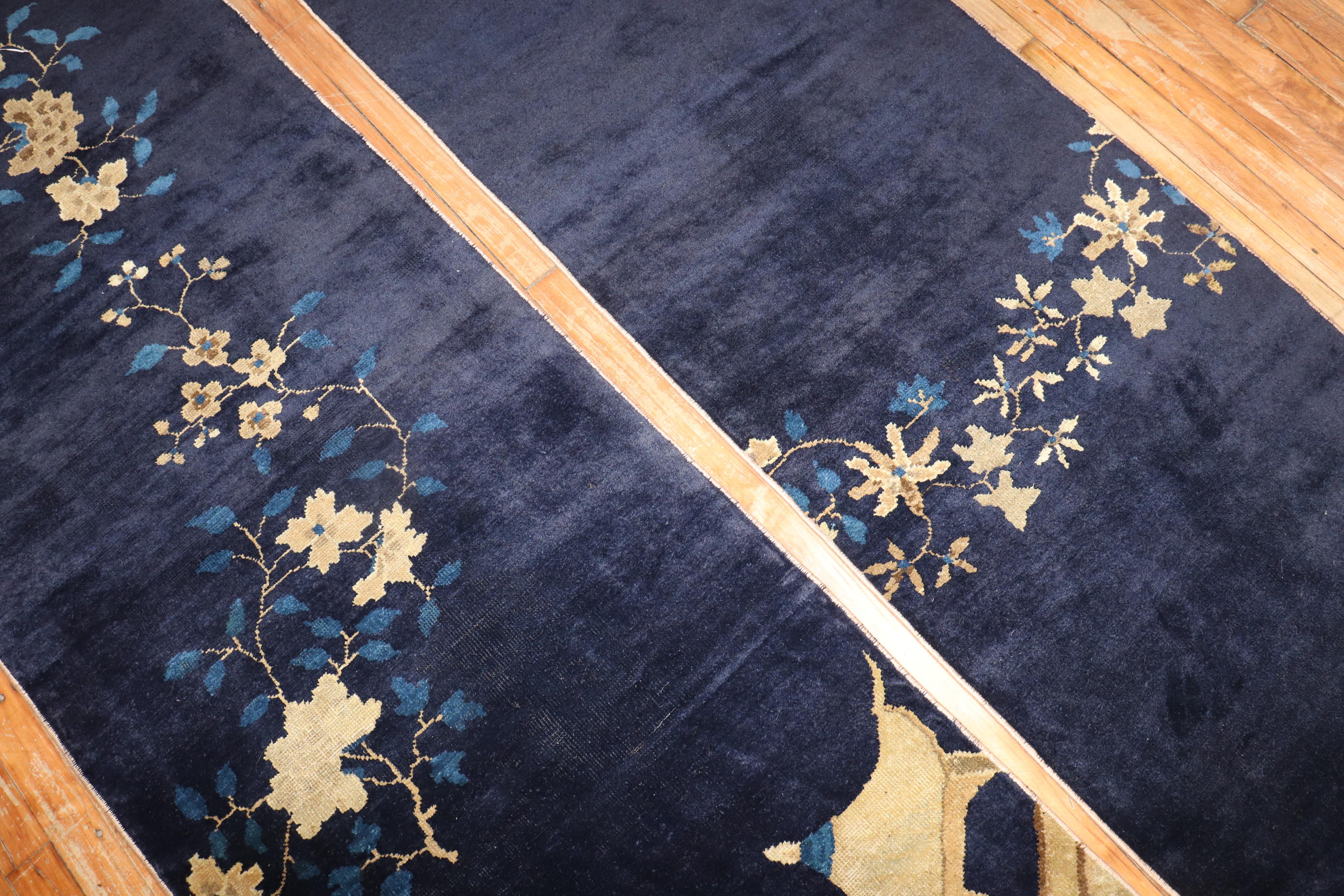 A pair of matching Decorative Chinese Peking Fragment navy blue runners from the early 20th century. 

Measures: 2'2'' x 16'6'' & 2'6'' x 16'6''.