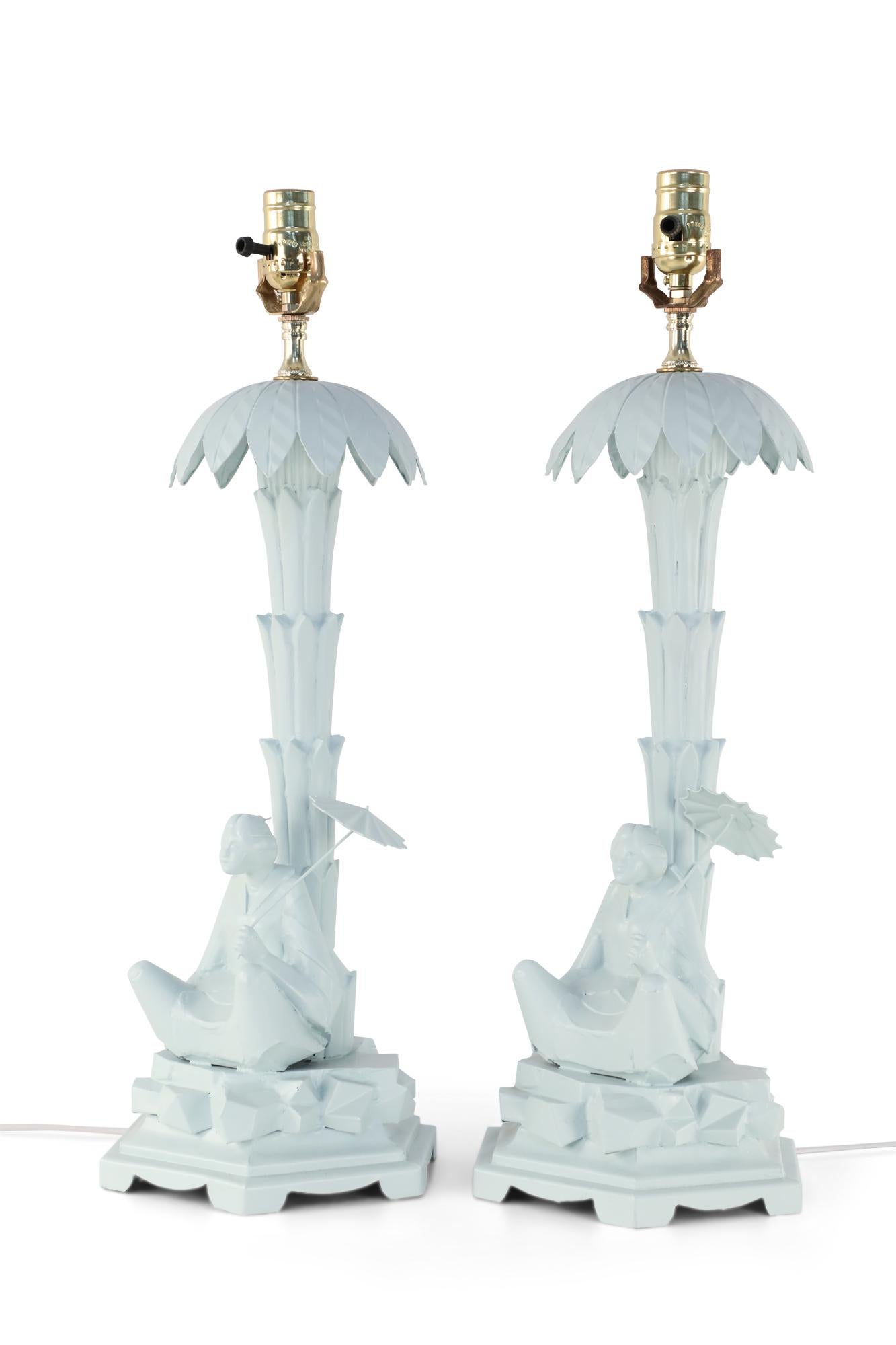 Pair of Chinese hand-made light blue tole table lamps depicting a woman holding an umbrella sitting in the shade of a palm tree.