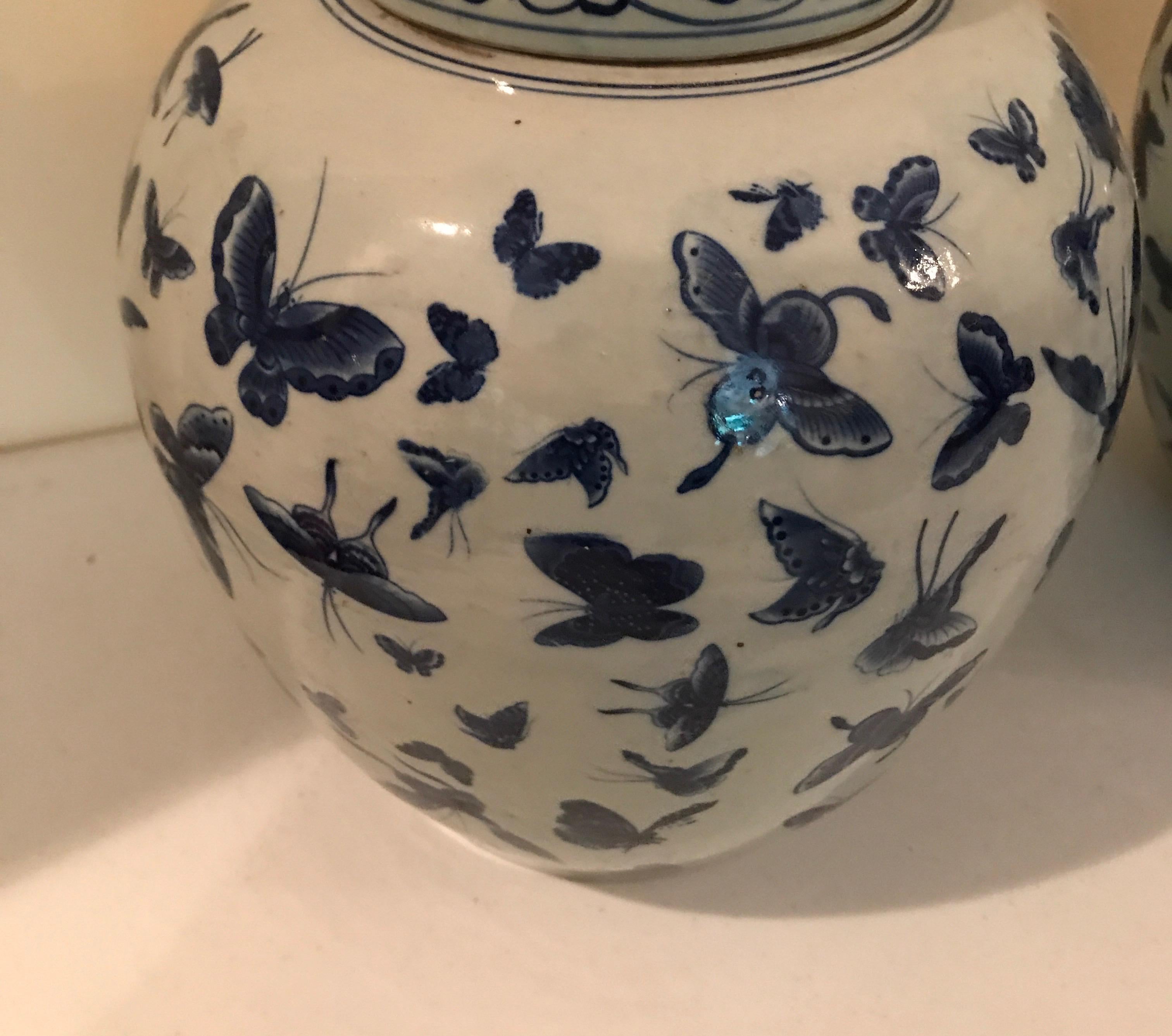 20th Century Pair of Chinese Blue and White Butterfly Ginger Jars