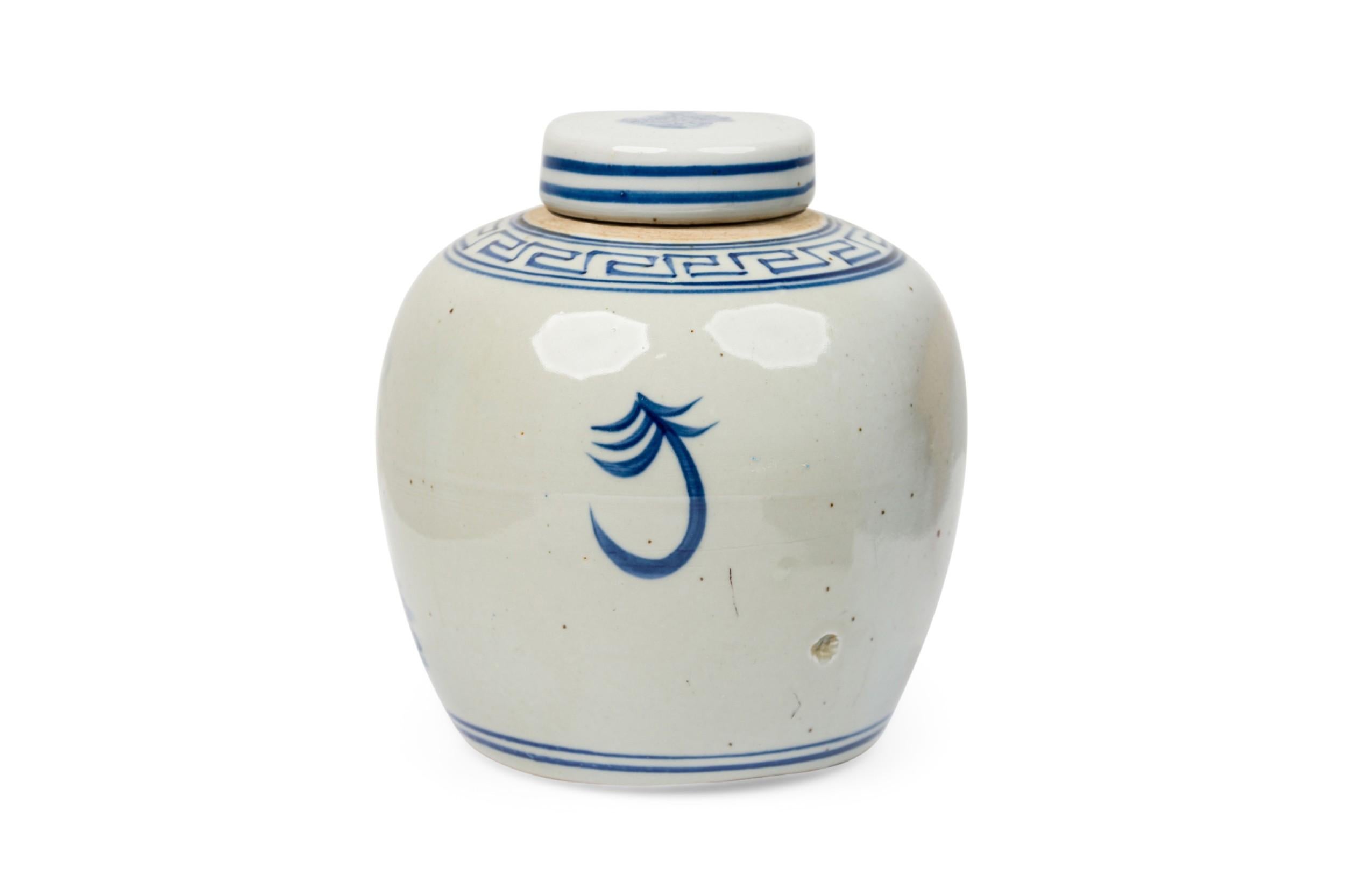Pair of Chinese Blue & White Porcelain Covered Jars with Figural Scenes In Good Condition For Sale In New York, NY