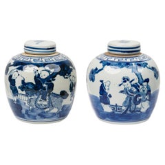 Pair of Chinese Blue
White Porcelain Covered Jars with Figural Scenes
