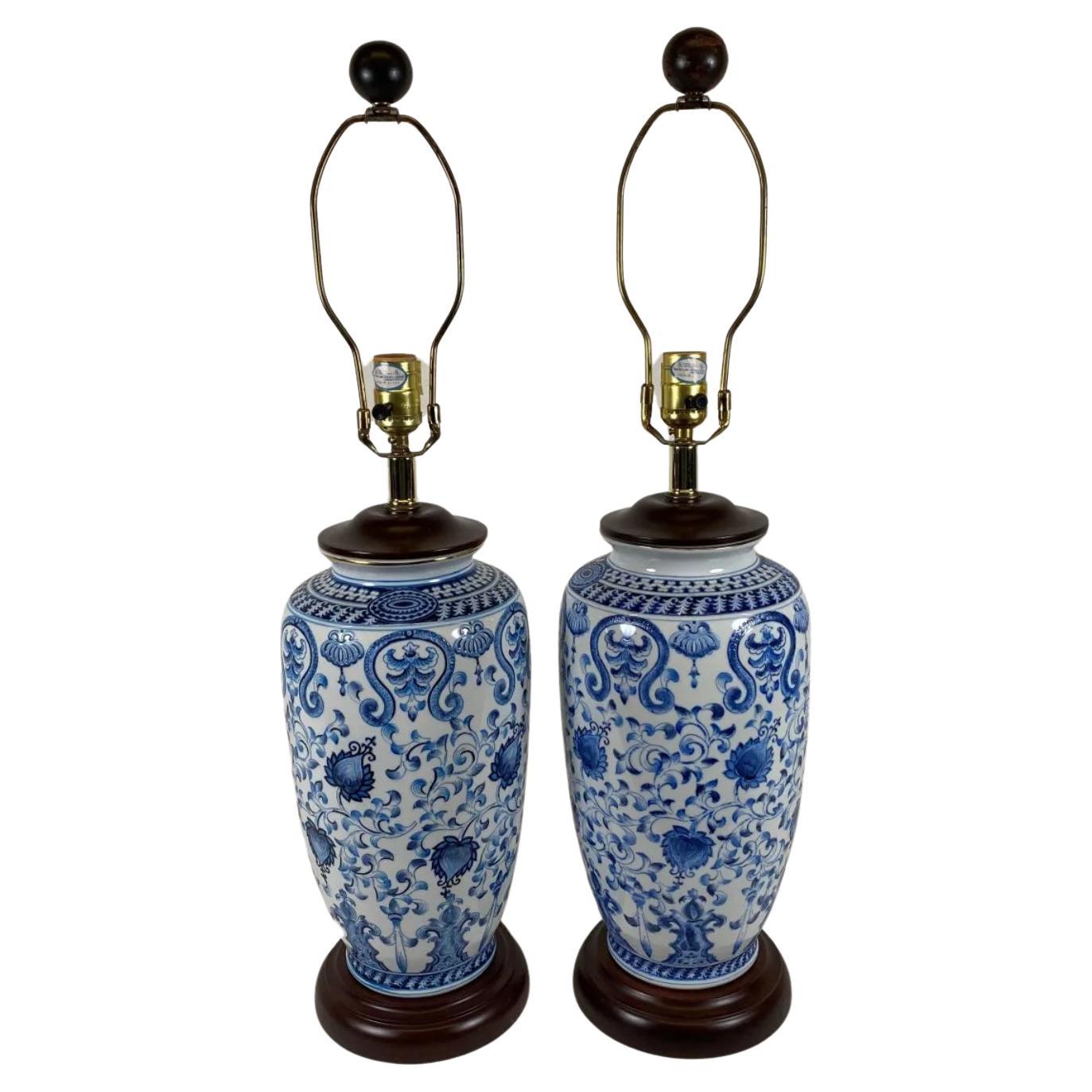 Pair of Chinese Blue & White Porcelain Lamps with Wooden Tops