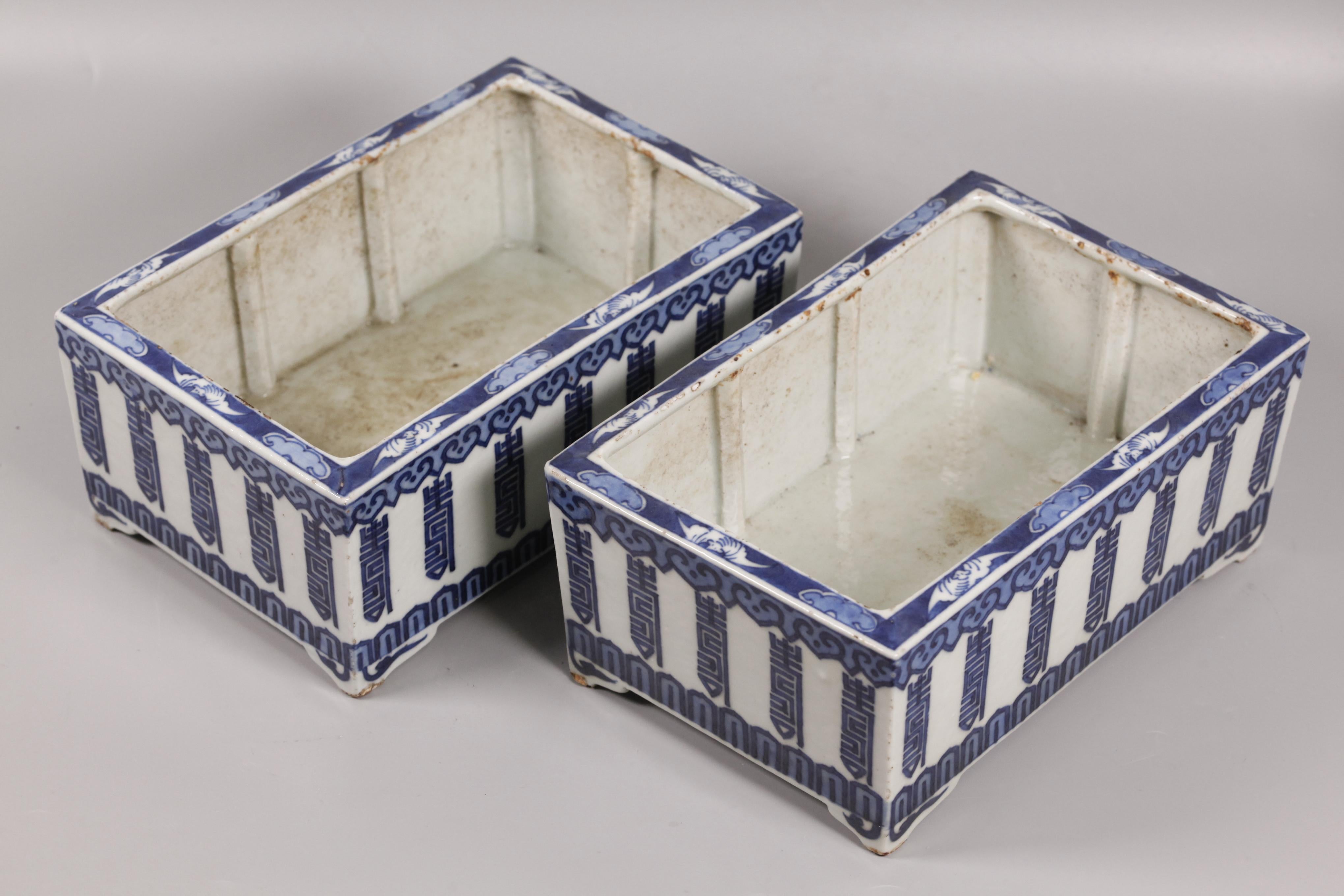 rectangular porcelain planters, each on a fitted wooden base; overall with wooden base: 7.7in(H) x 10in(L) x 6.5in(D); planter only: 9.6in(L) x 6.1in(D) x 3.8in(H)