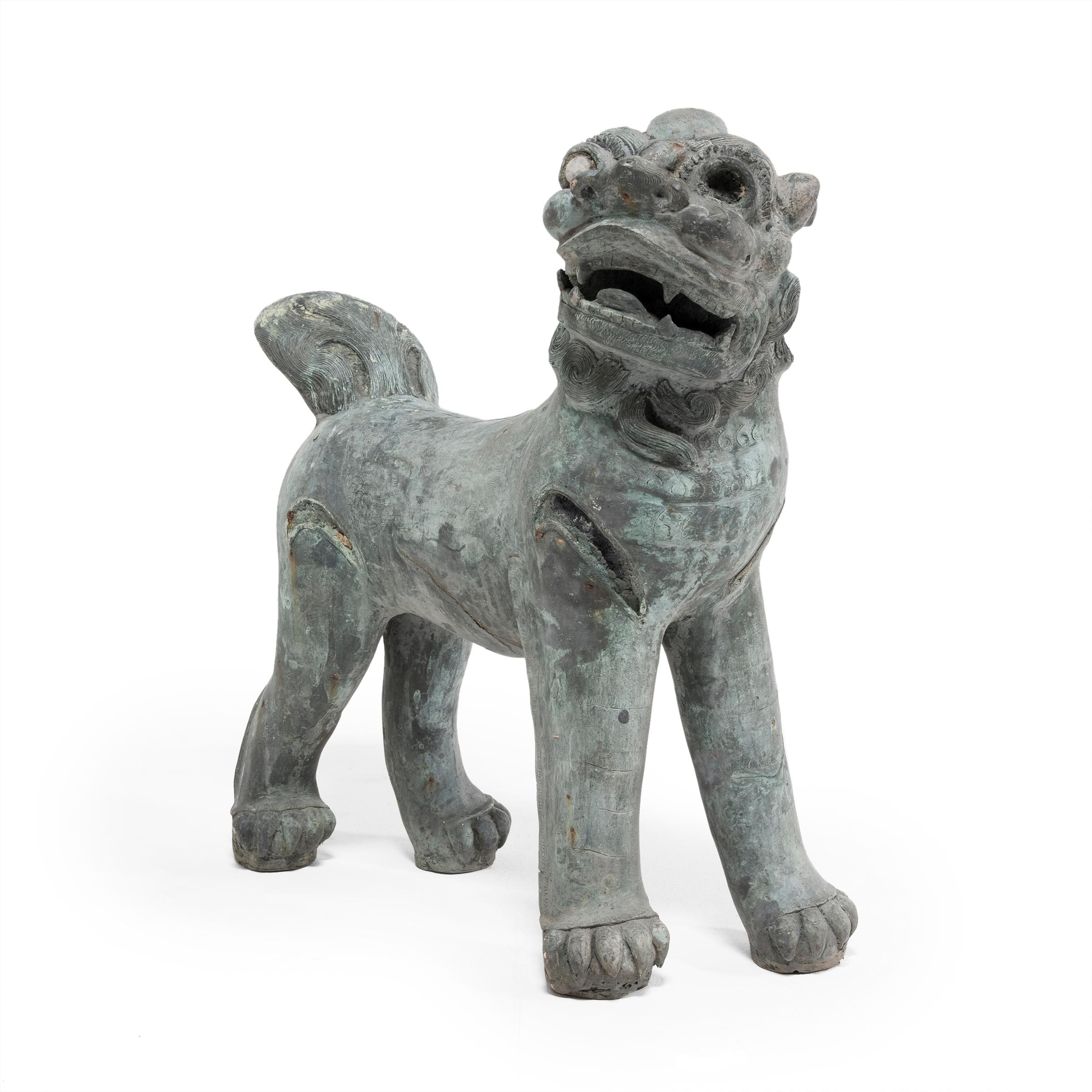 These tall bronze Fu lions once guarded the entrance to a grand Chinese home. Also known as shizi, pairs of fu dog lions are believed to be benevolent protectors and are traditionally placed at the thresholds of sacred spaces, such as homes,