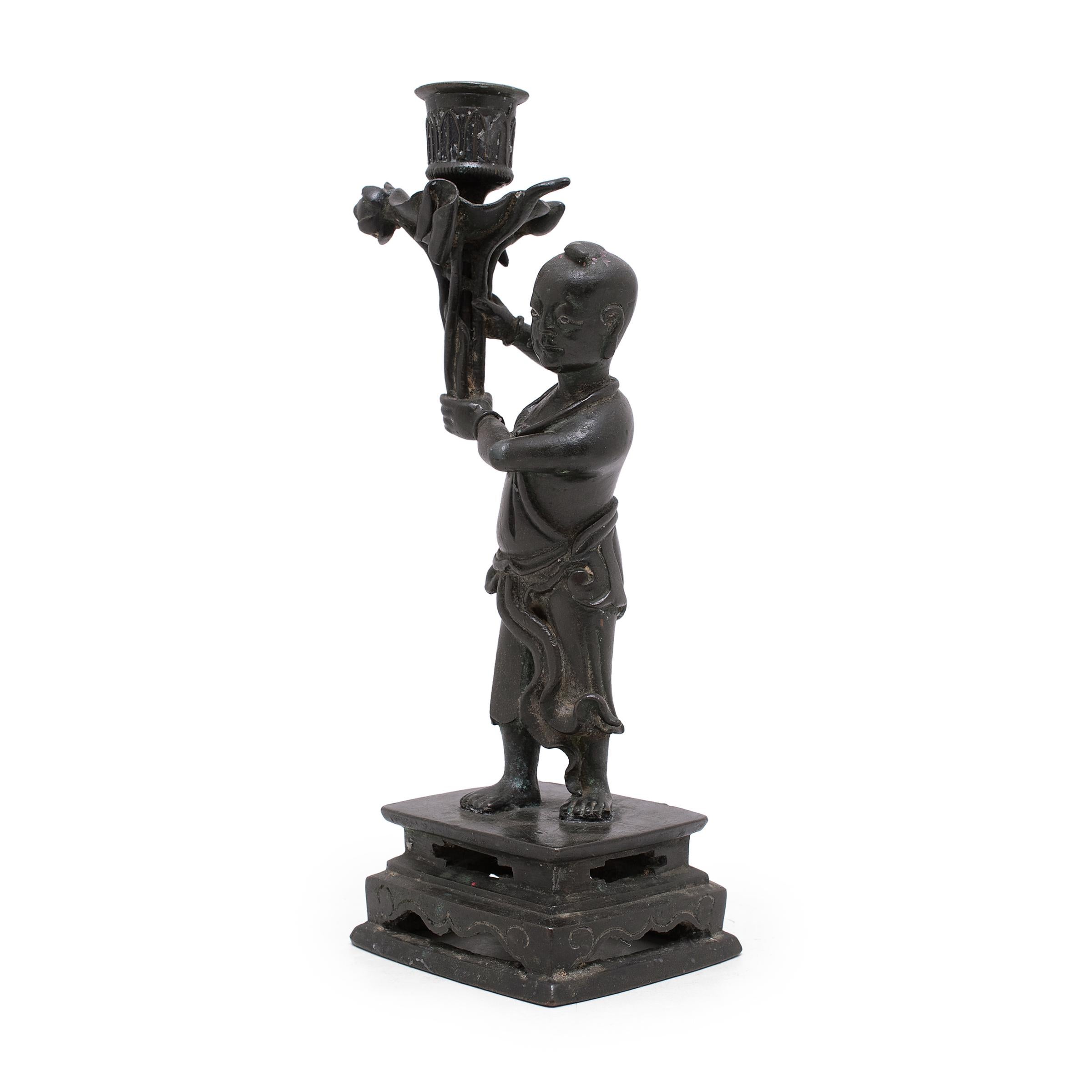 Chinoiserie Pair of Chinese Bronze Ho Ho Boy Candle Stands, C. 1900 For Sale