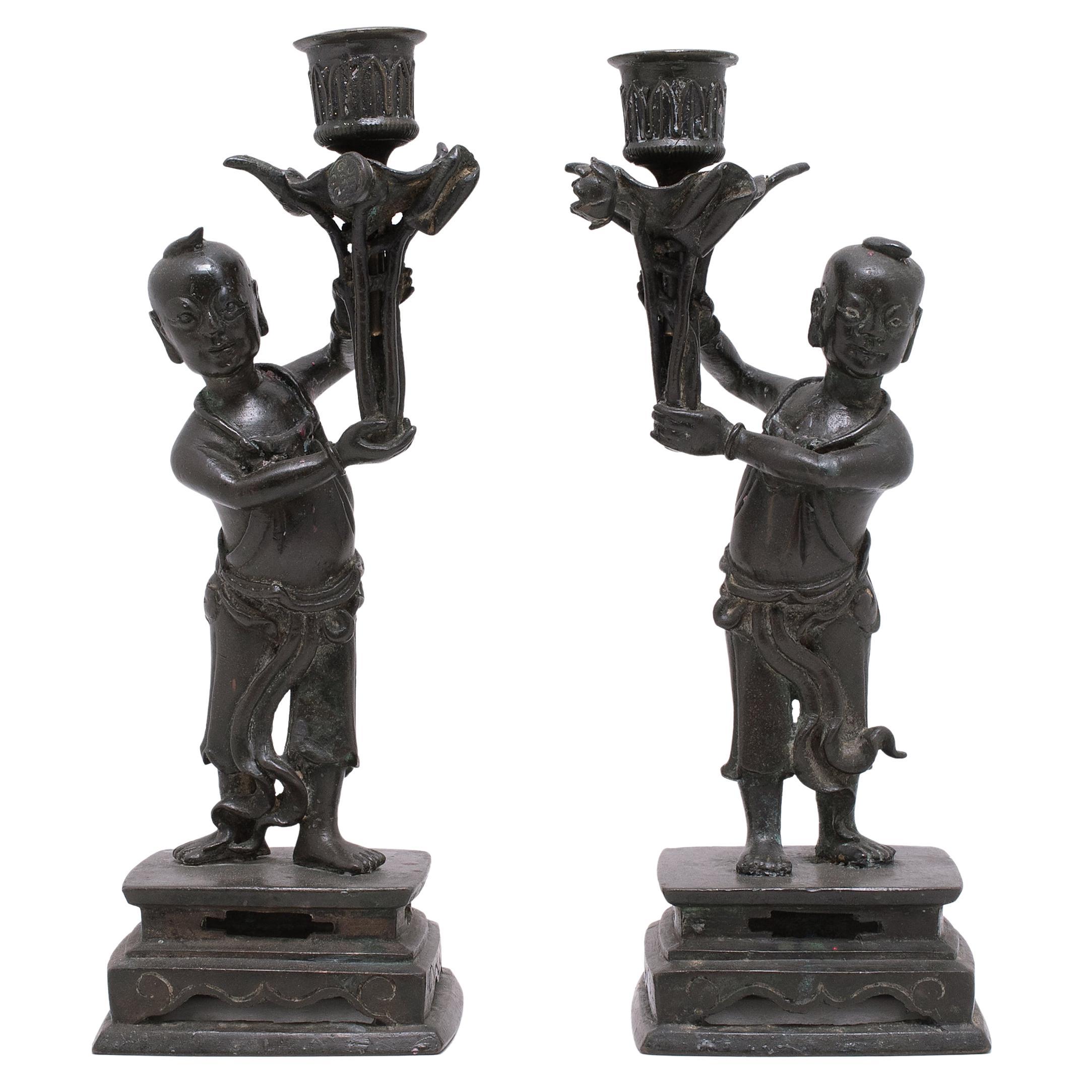 Pair of Chinese Bronze Ho Ho Boy Candle Stands, C. 1900 For Sale