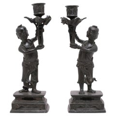 Antique Pair of Chinese Bronze Ho Ho Boy Candle Stands, C. 1900