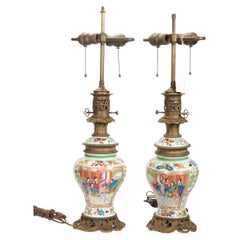 Pair of Chinese Bronze Mounted Rose Mandarin Porcelain Lamps