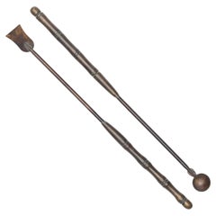 Paire de grattoirs chinois en opium et bronze, vers 1900