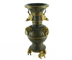 Pair of Chinese Bronze Vases with Parcel-Gilt Features