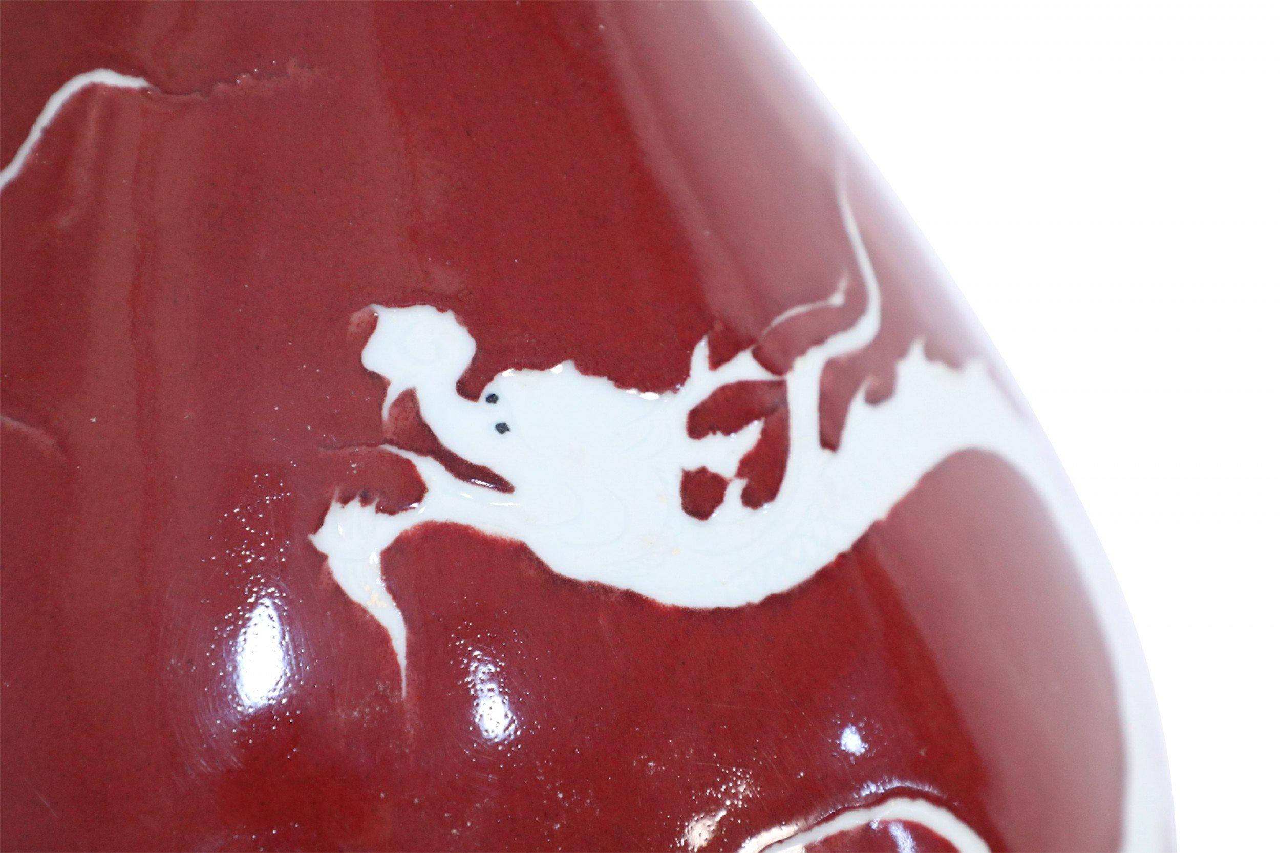 Pair of Chinese Burgundy and White Dragon Motif Vases 4