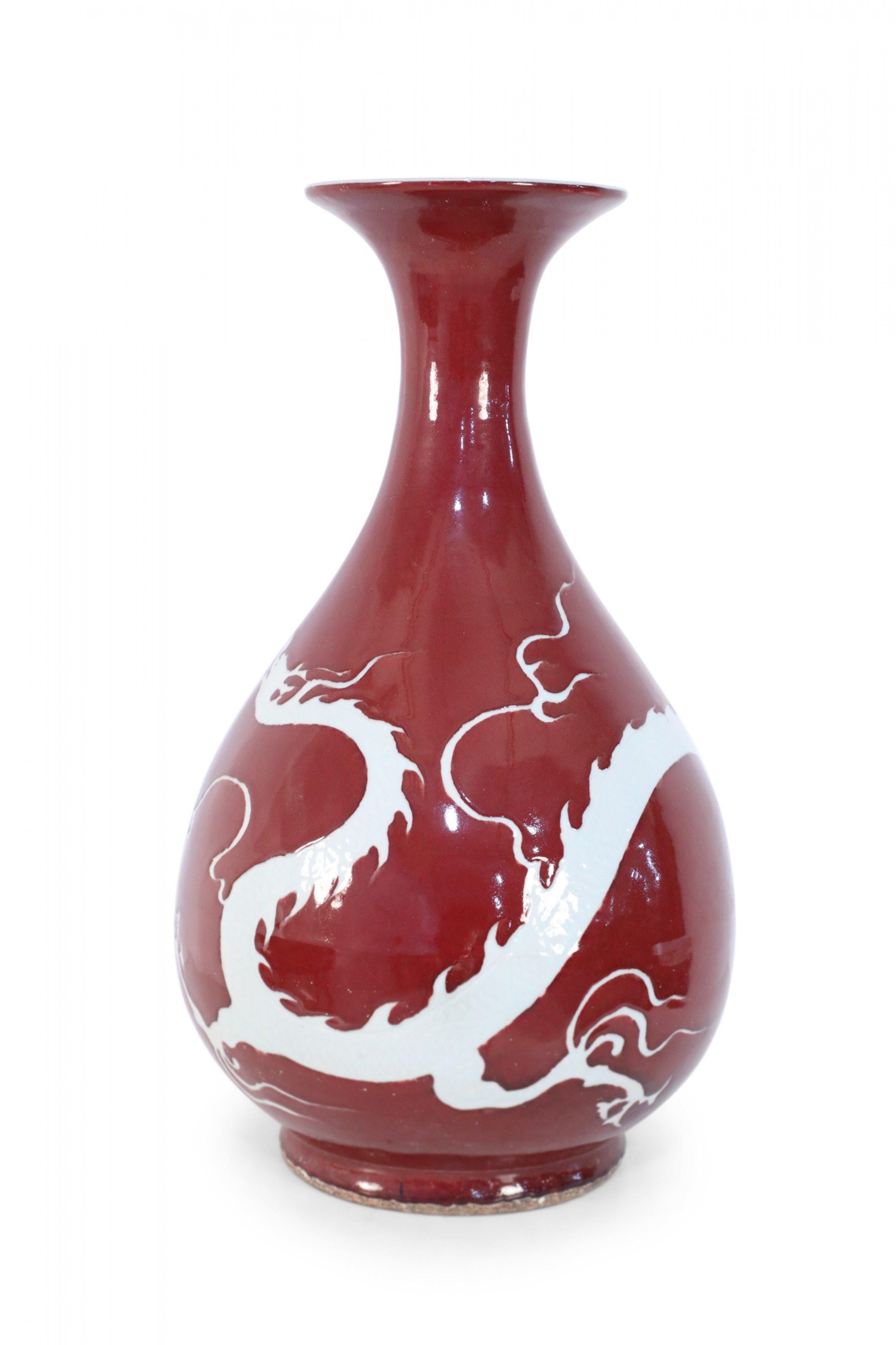 Chinese Export Pair of Chinese Burgundy and White Dragon Motif Vases