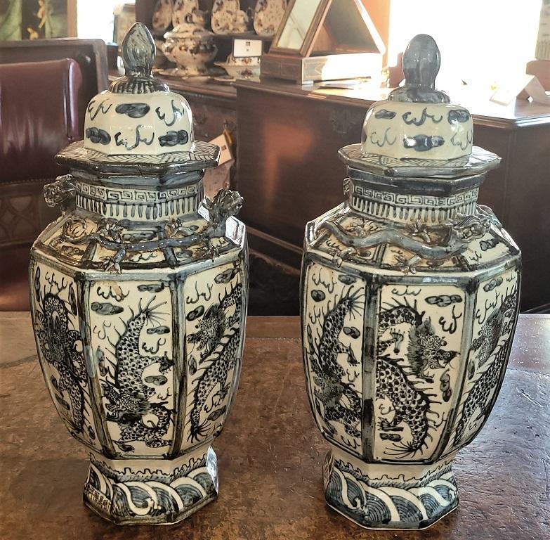 Chinese Export Pair of Chinese B&W Hand Painted Dragon Urns