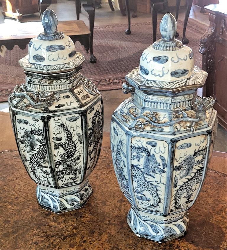 Pair of Chinese B&W Hand Painted Dragon Urns 1